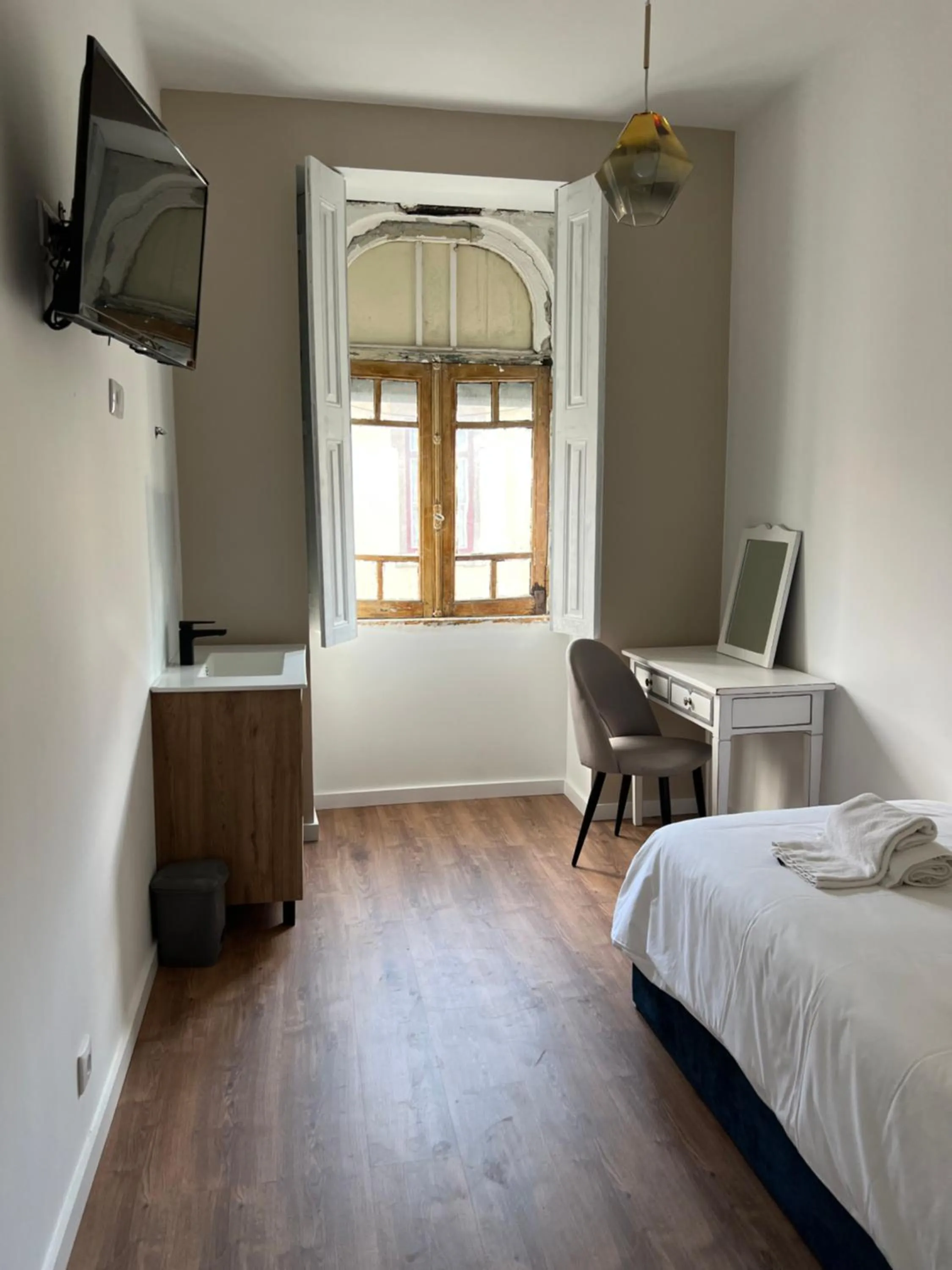 Bed in A Portuguesa Guest House