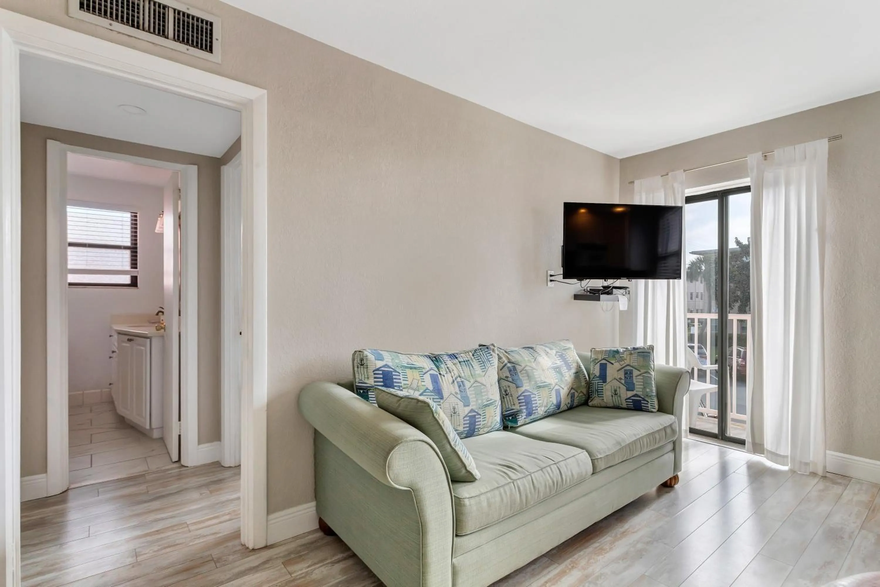 Living room in Gulf Winds Resort by Travel Resort Services