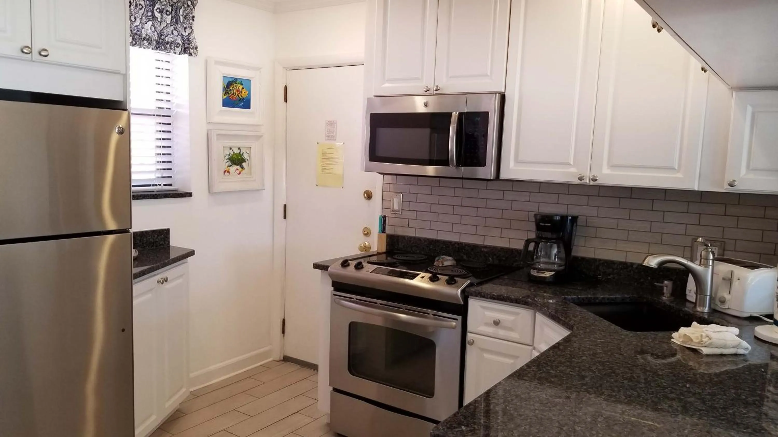 Kitchen or kitchenette in Gulf Winds Resort by Travel Resort Services