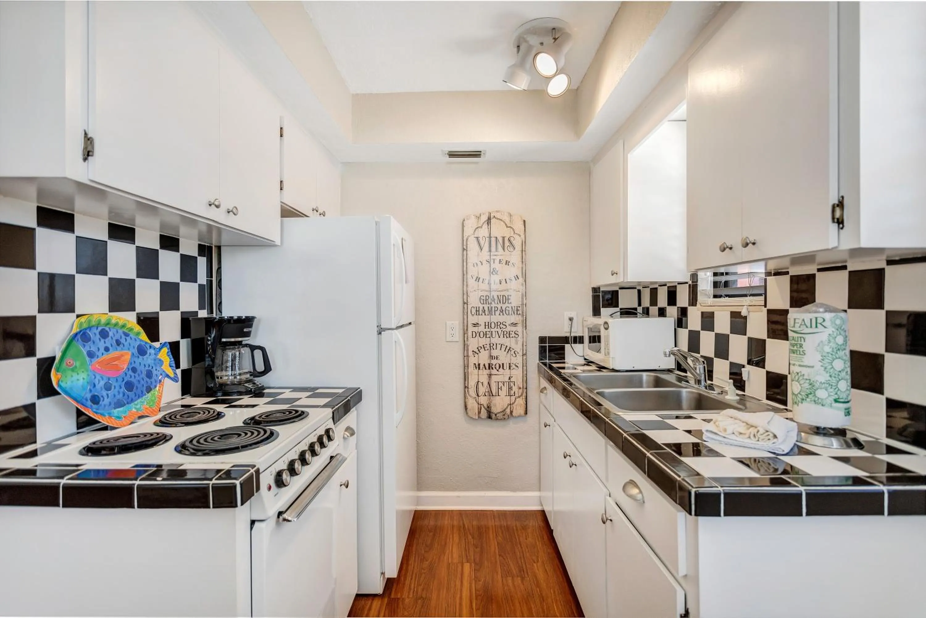 Kitchen or kitchenette in Gulf Winds Resort by Travel Resort Services