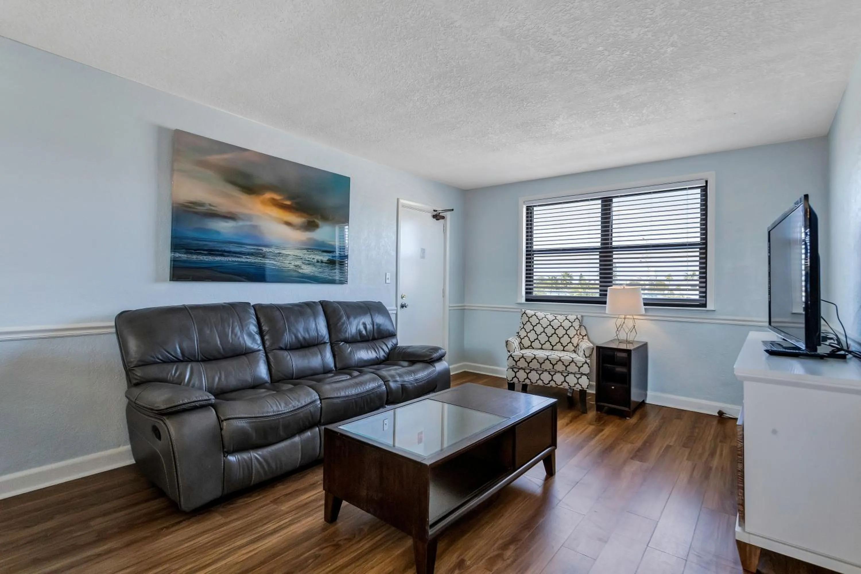 Living room in Gulf Winds Resort by Travel Resort Services