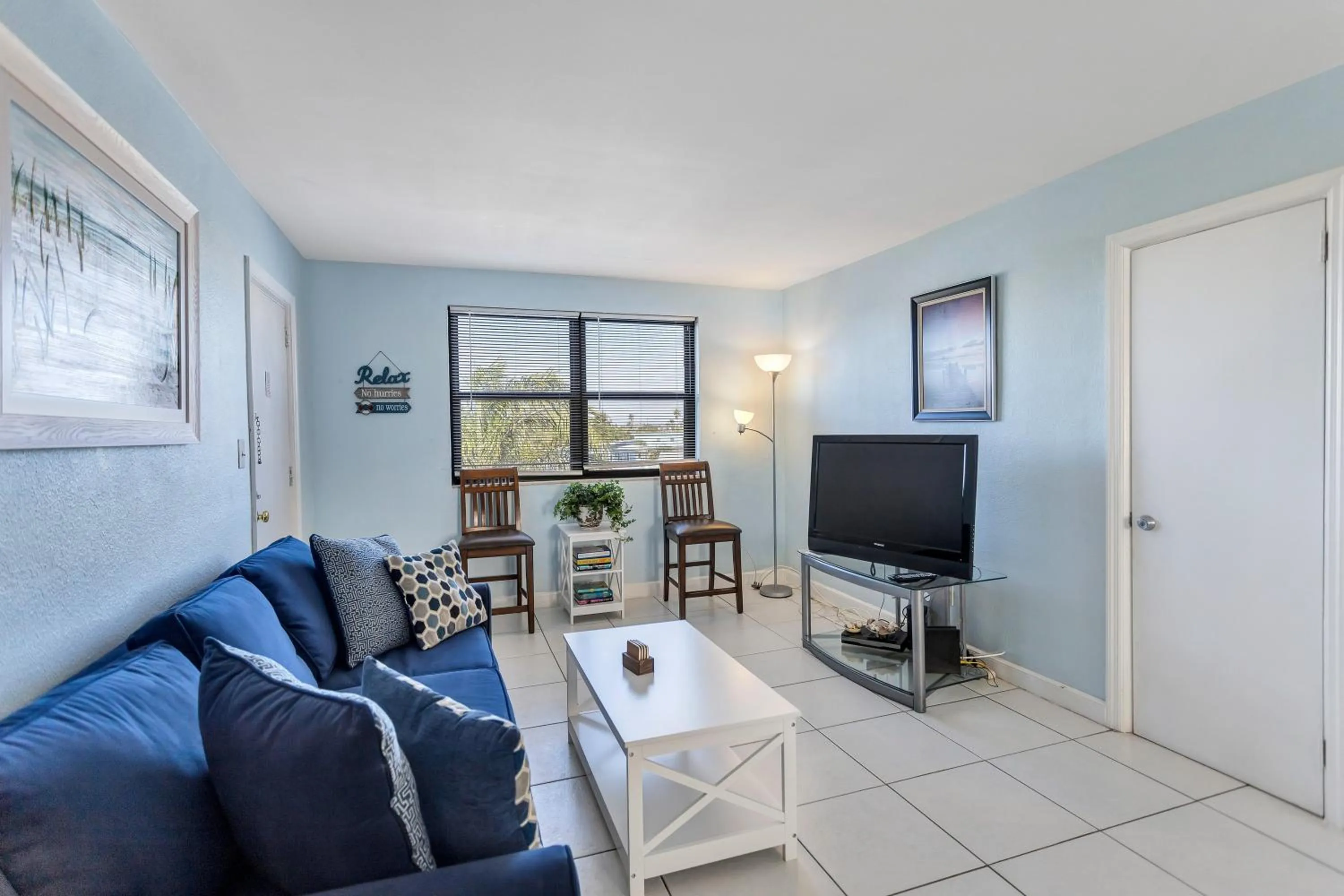 Living room in Gulf Winds Resort by Travel Resort Services