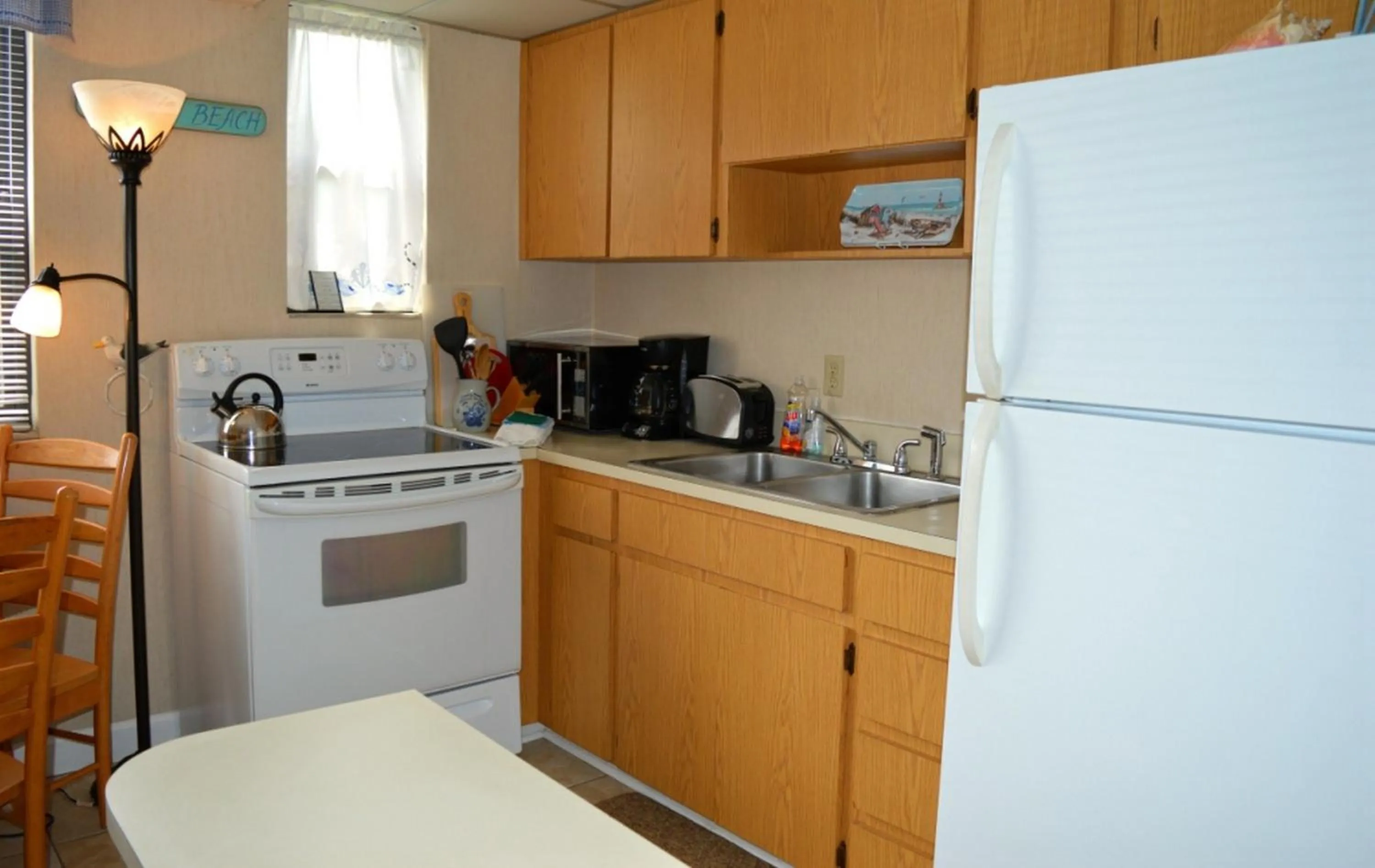 Kitchen or kitchenette in Gulf Winds Resort by Travel Resort Services