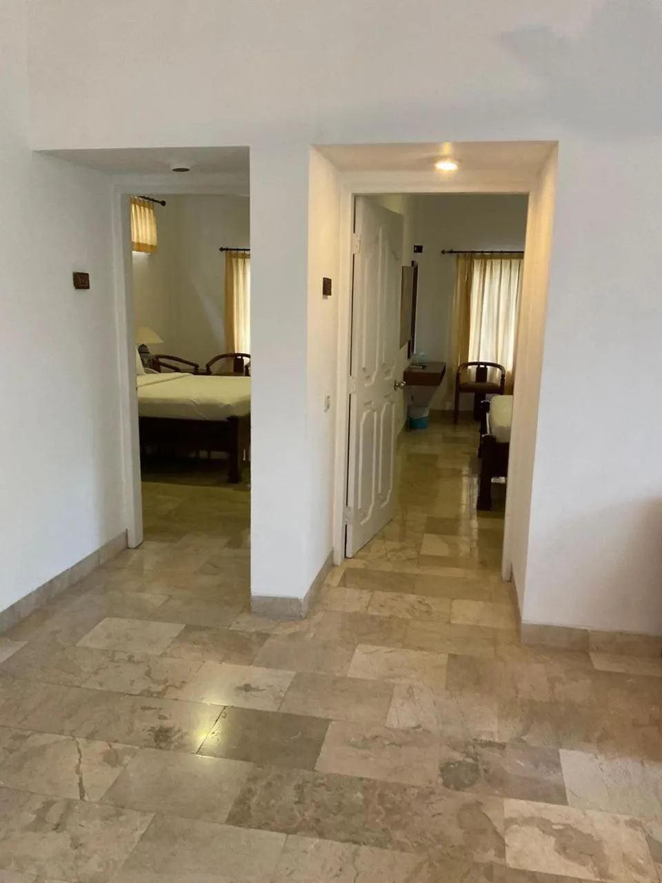 Family Double Room with Balcony and Living Room in Sari Bunga Hotel Legian Kuta Bali