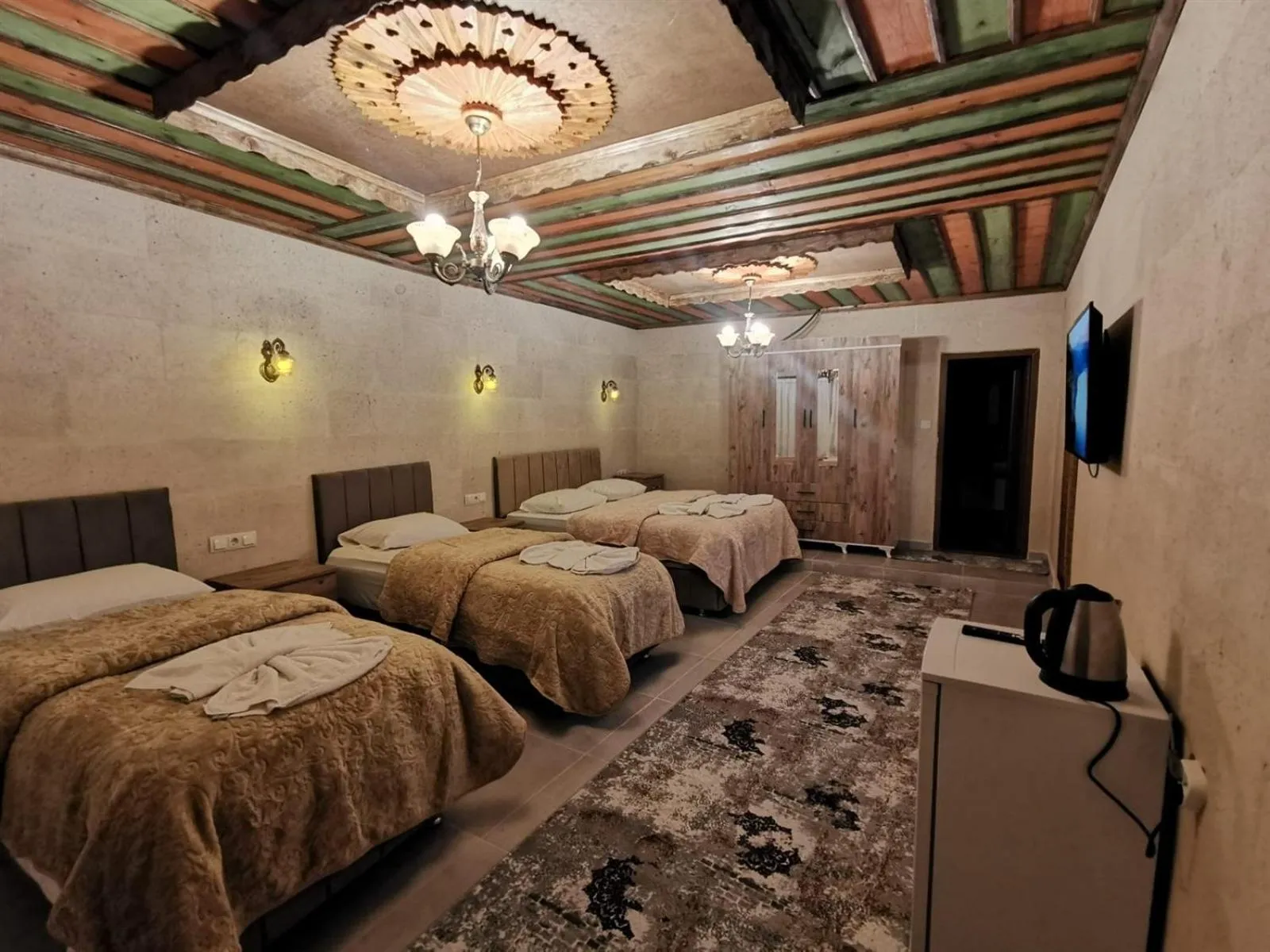 Bed in Falcon Cave Suites