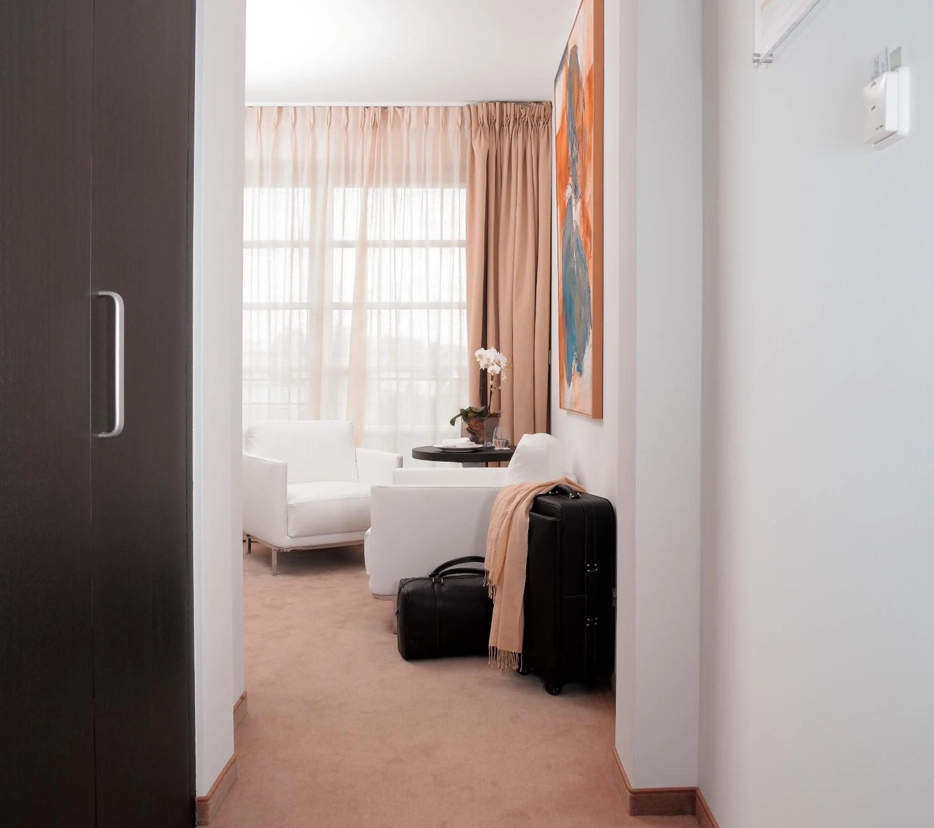 Seating area, Bed in Hotel Alzinn