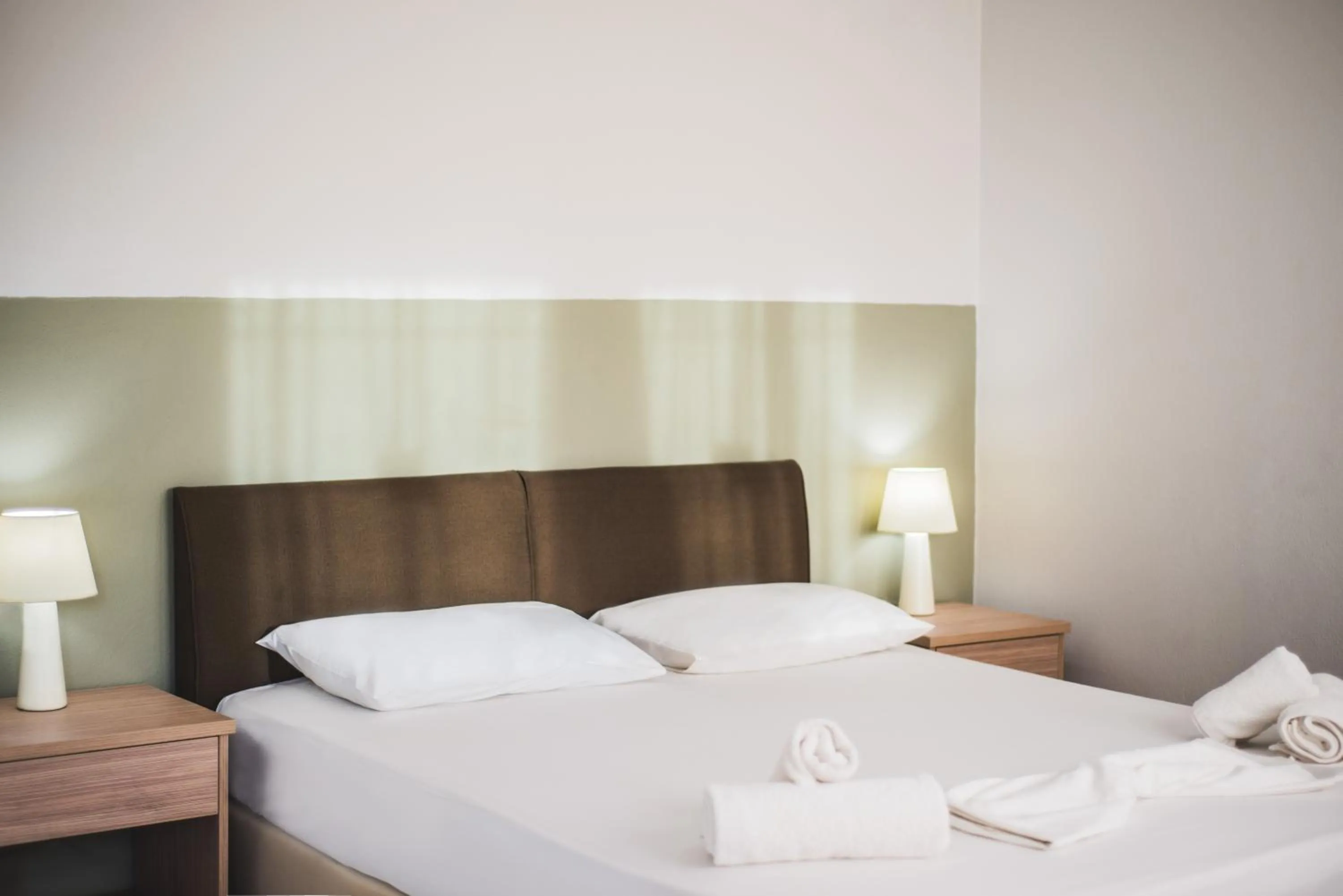 Bed in Stefania Studios by Estia