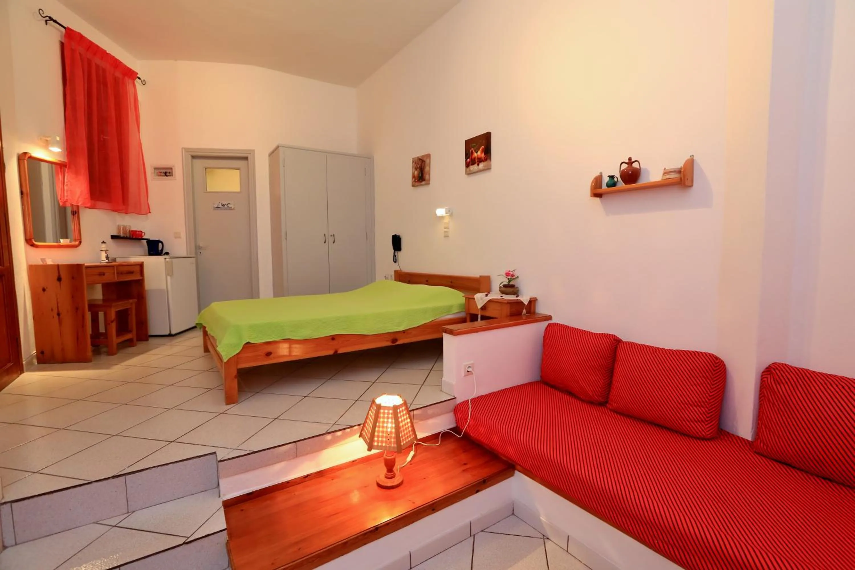 Bedroom in Froudi Rooms