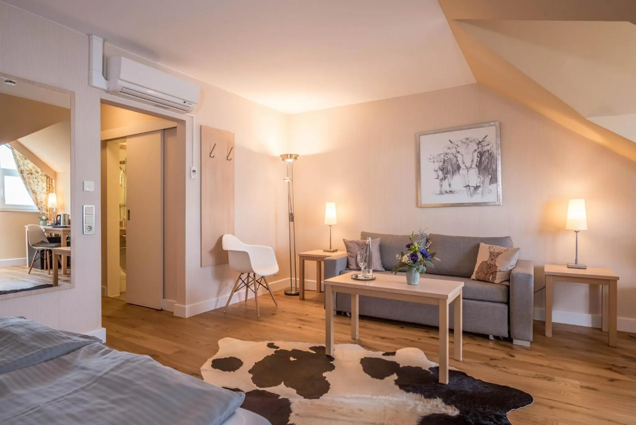 Seating area, Bed in Ammersee-Hotel