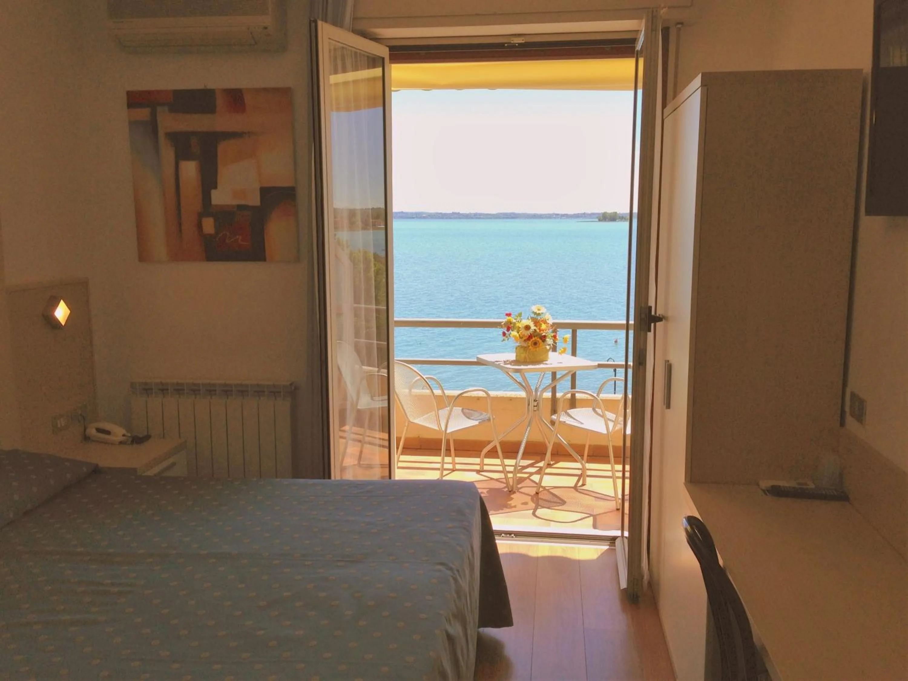 Balcony/Terrace, Bed in Hotel Ca' Serena