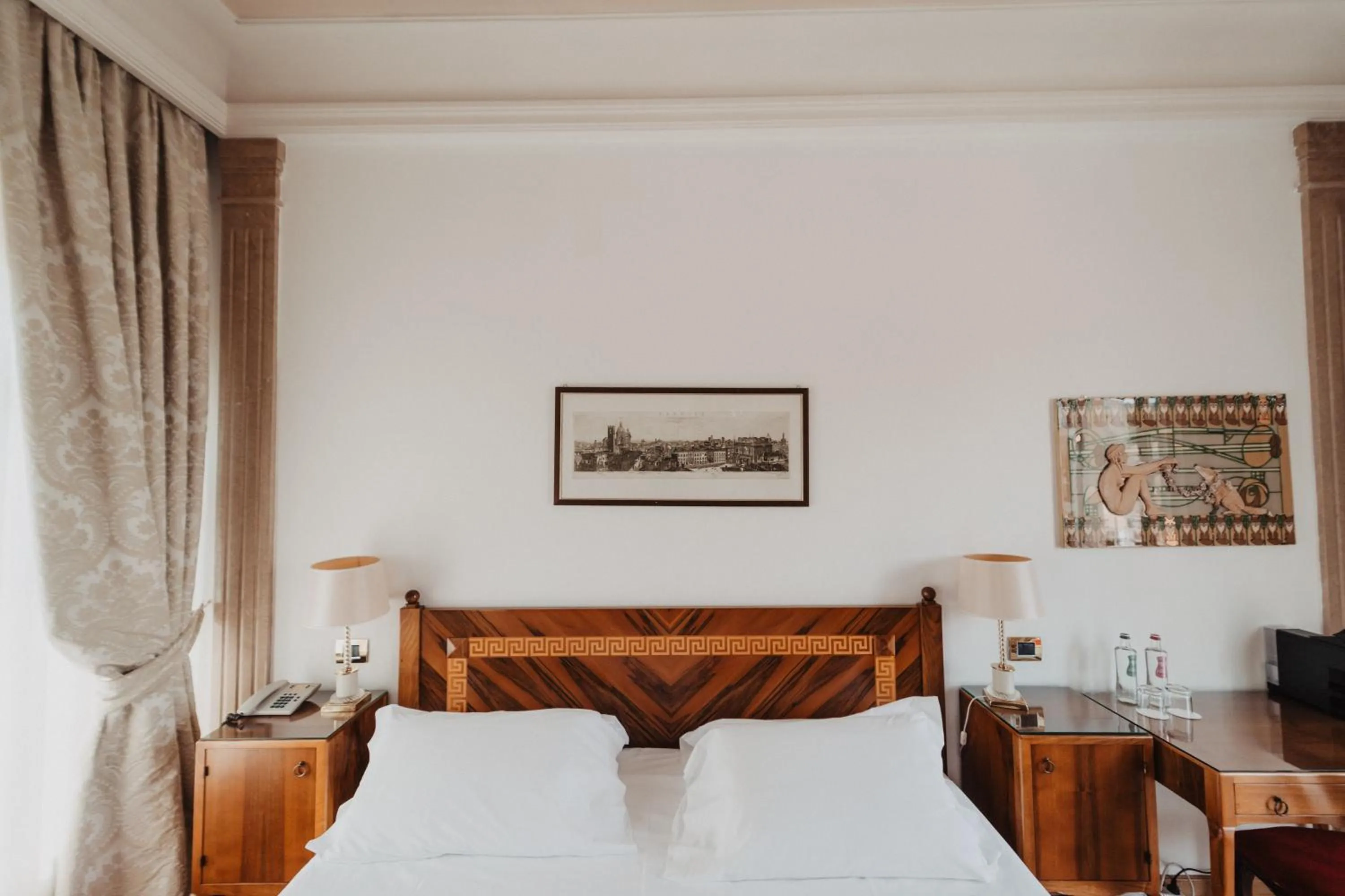 Bed in Hotel Vittoria