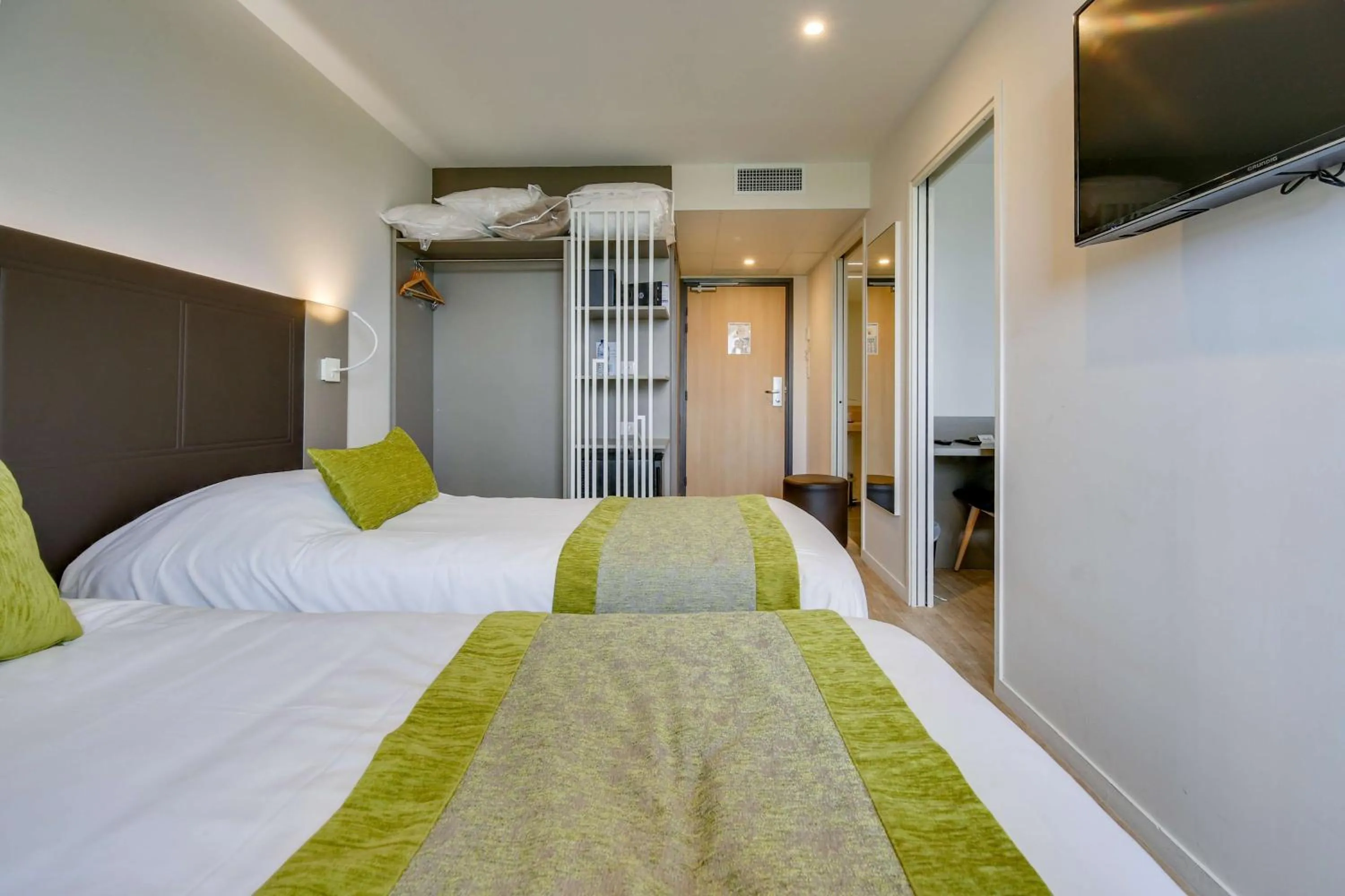 Bedroom, Bed in Brit Hotel Confort Saint-Dizier