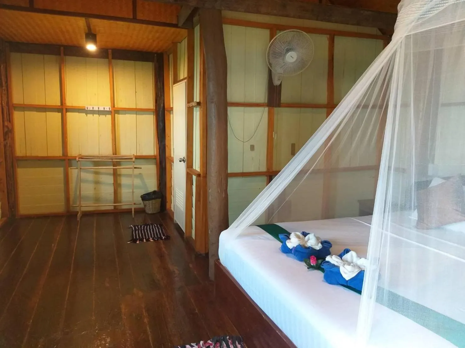 Bed in Jungle Hill Beach Bungalow