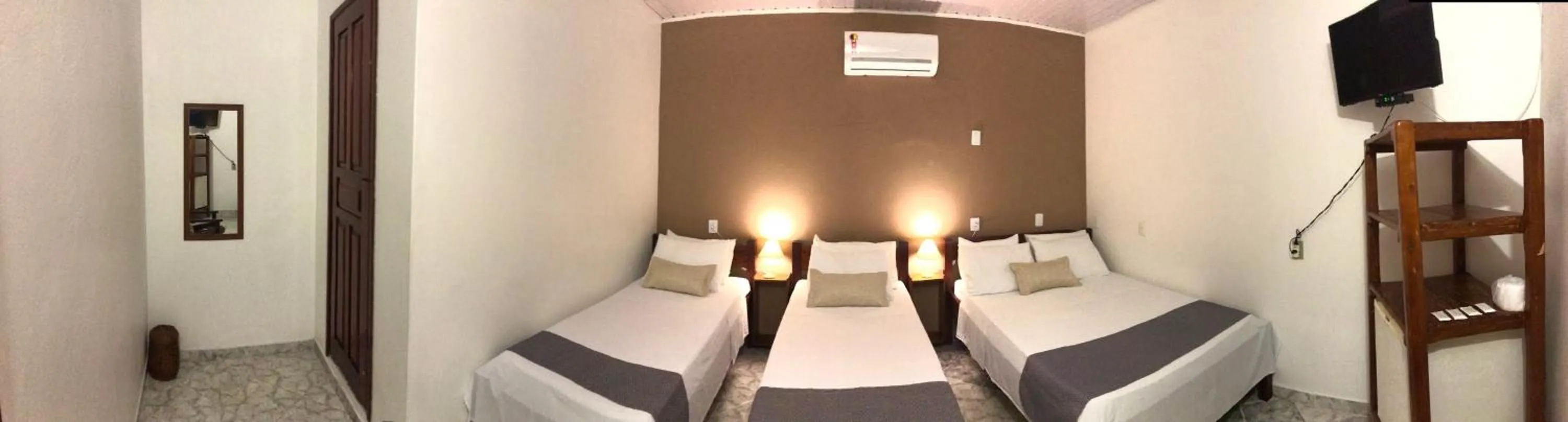 Photo of the whole room in Pousada Ilha do Encanto