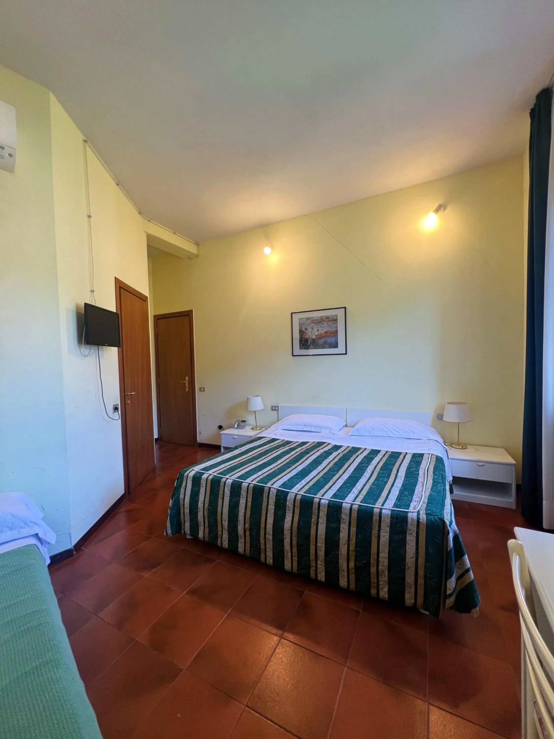 Bed in Hotel Le Grazie