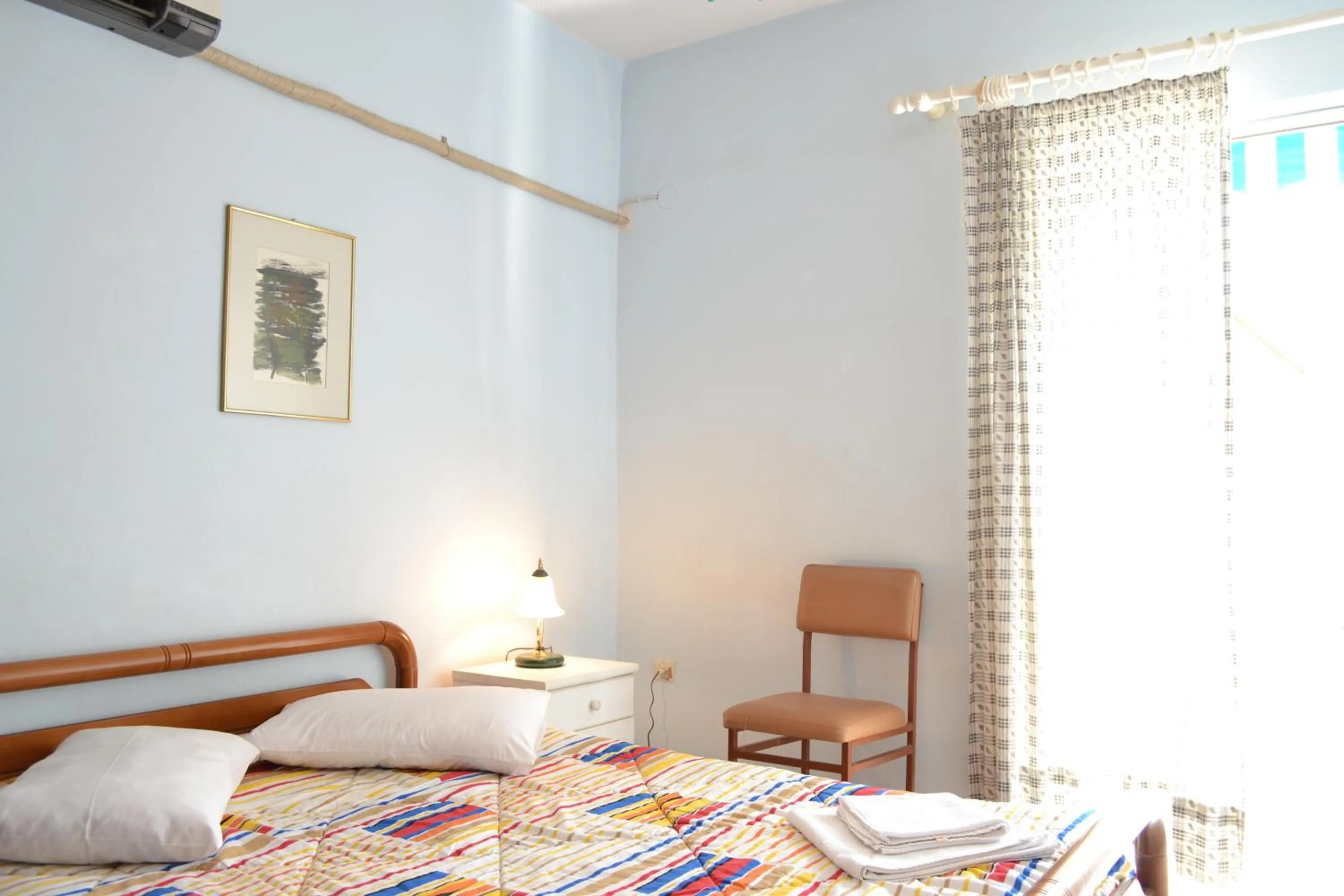 Bed in Oniro Apartments