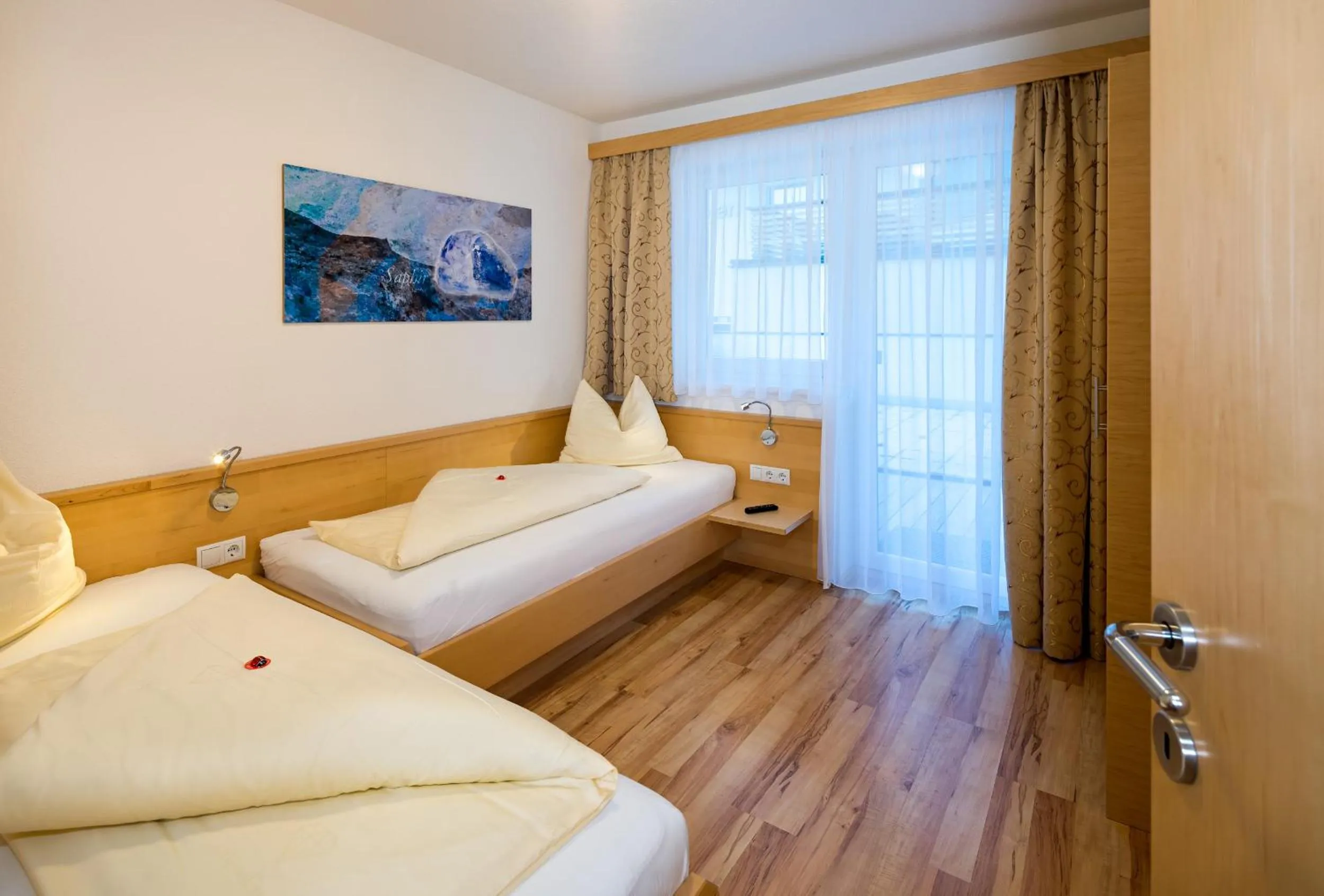 Bed in Aparthotel Alpendiamant Serfaus Wachter GmbH