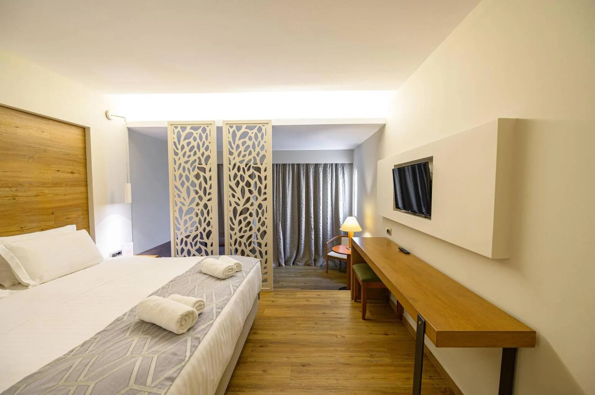 Bed in Olympion Asty Hotel