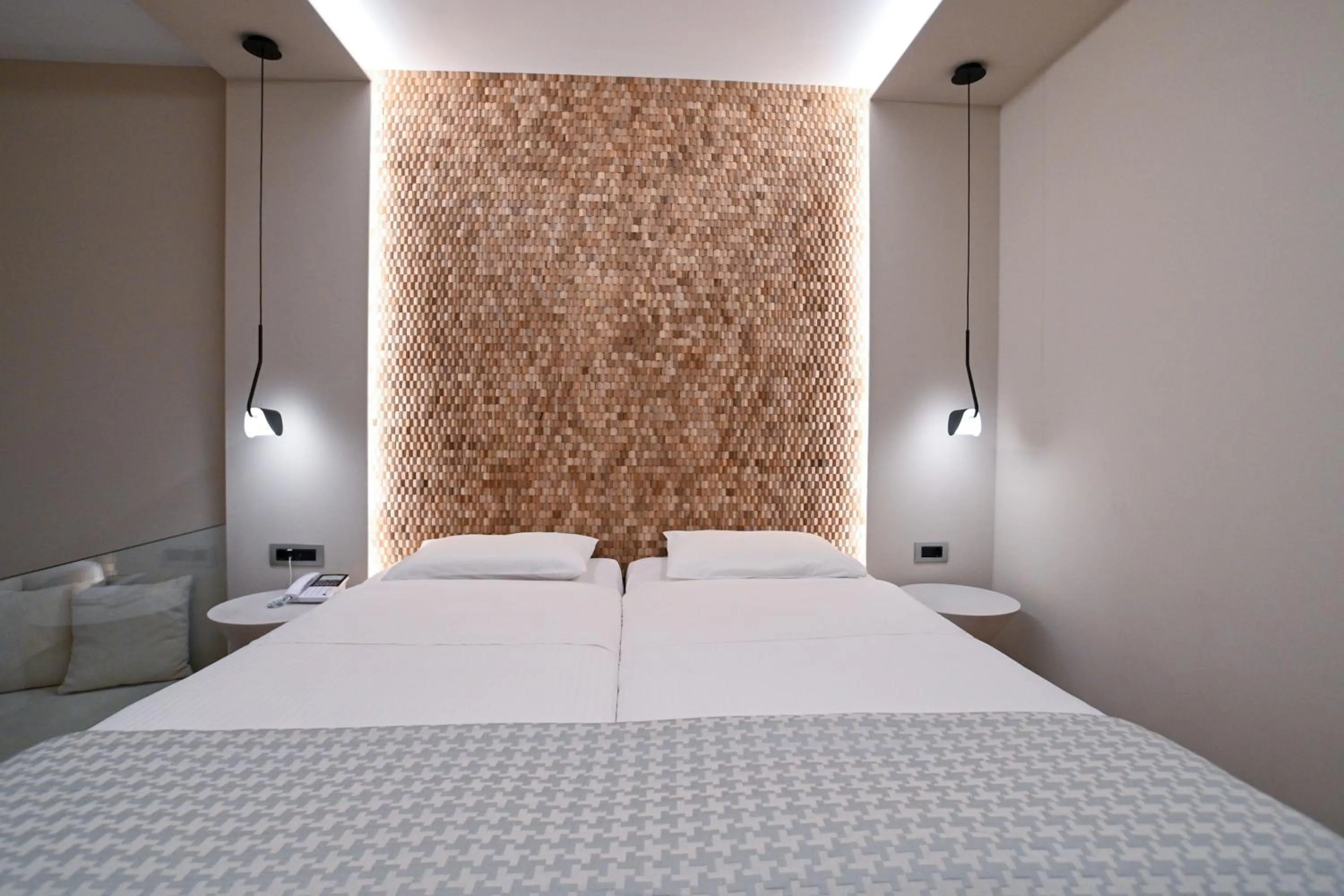 Bed in Olympion Asty Hotel