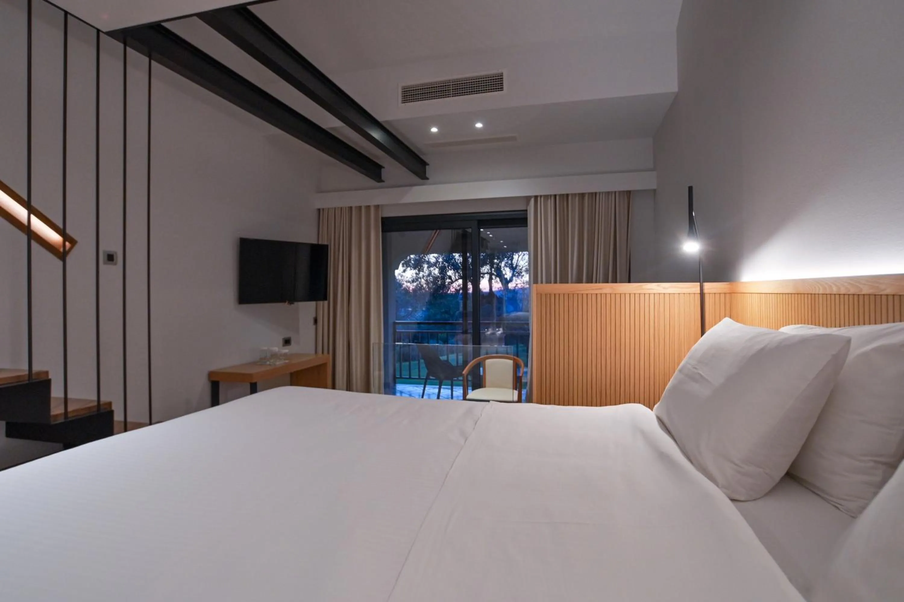 Bed in Olympion Asty Hotel