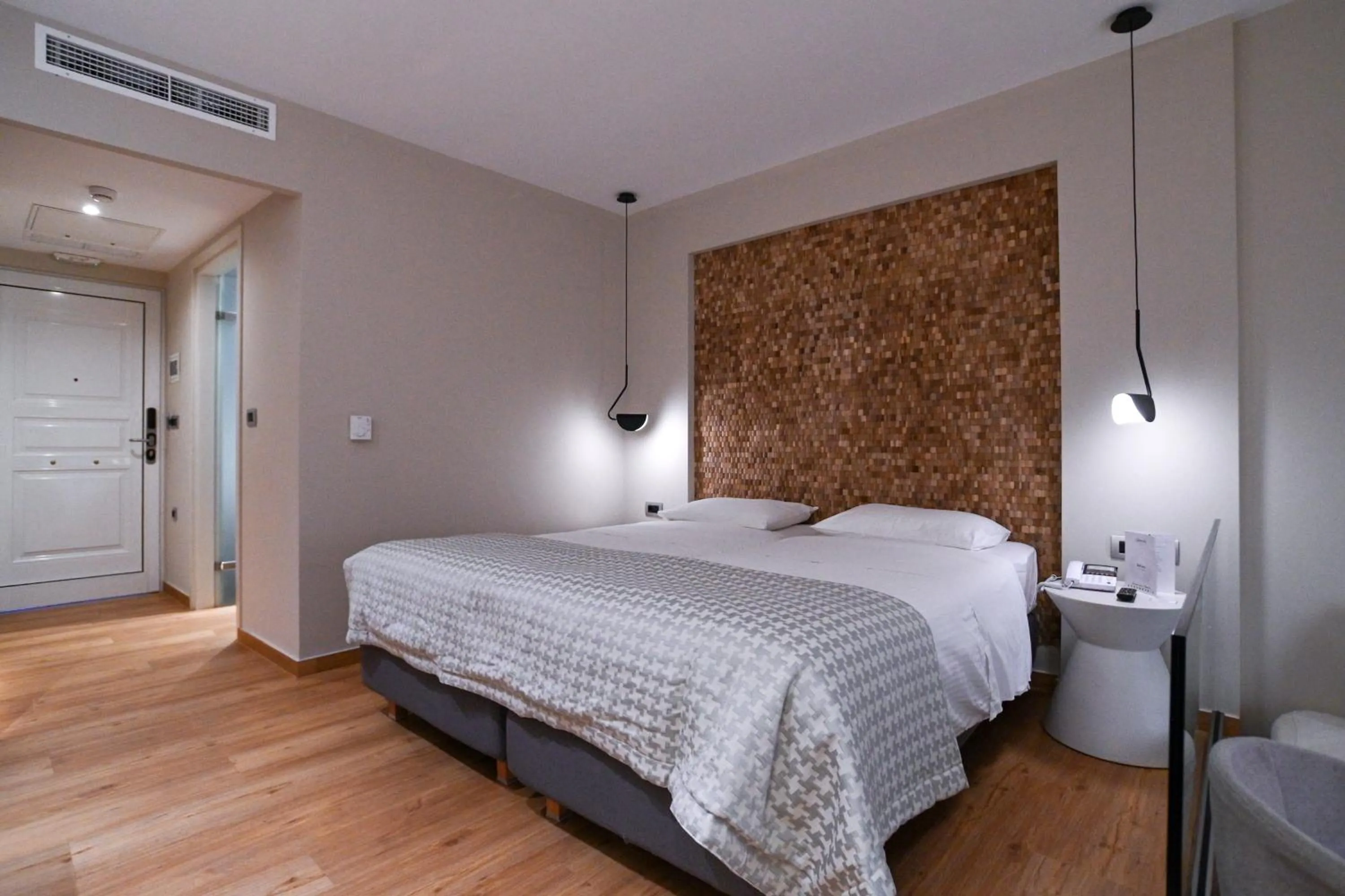 Bed in Olympion Asty Hotel