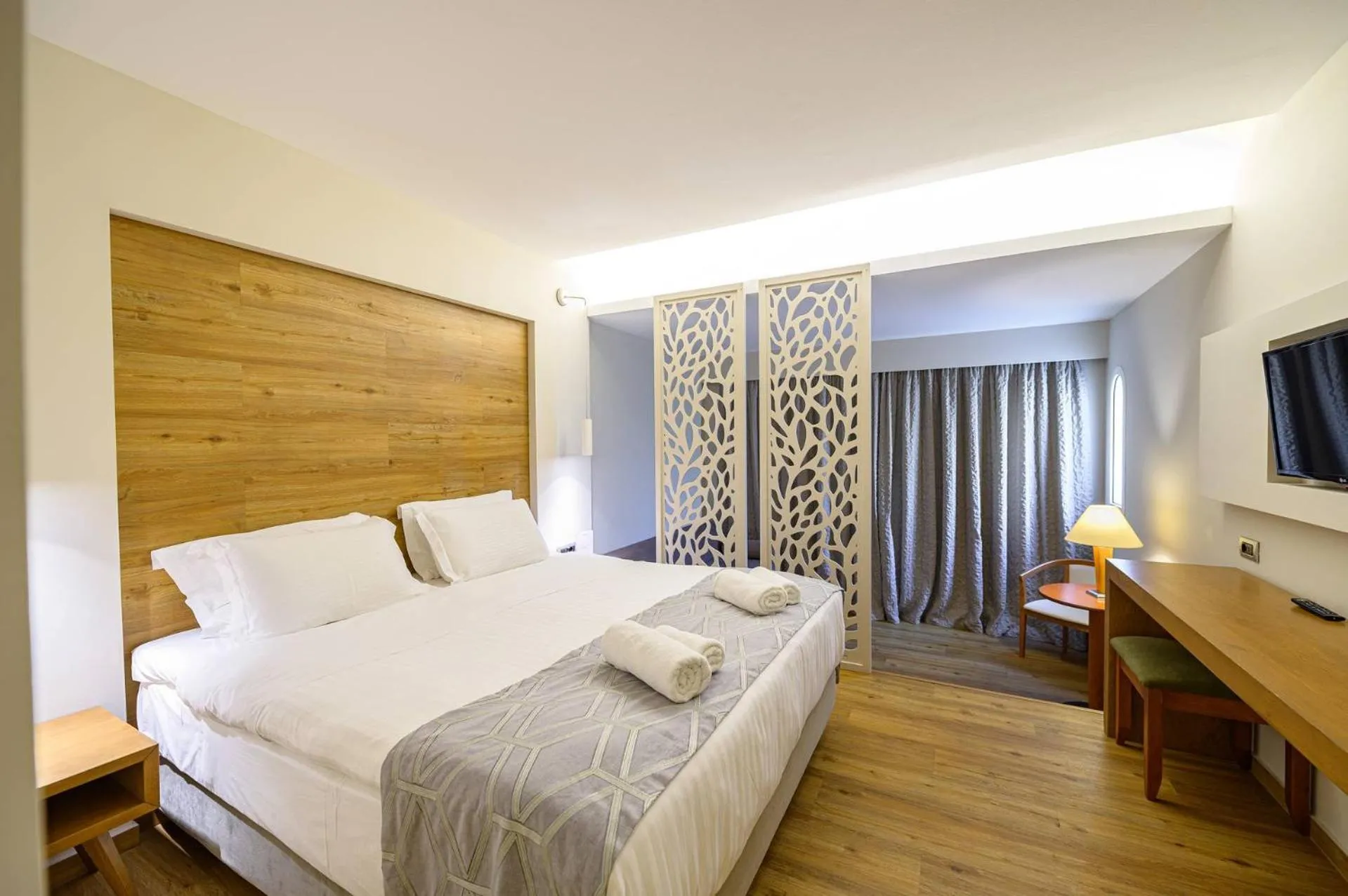 Bed in Olympion Asty Hotel