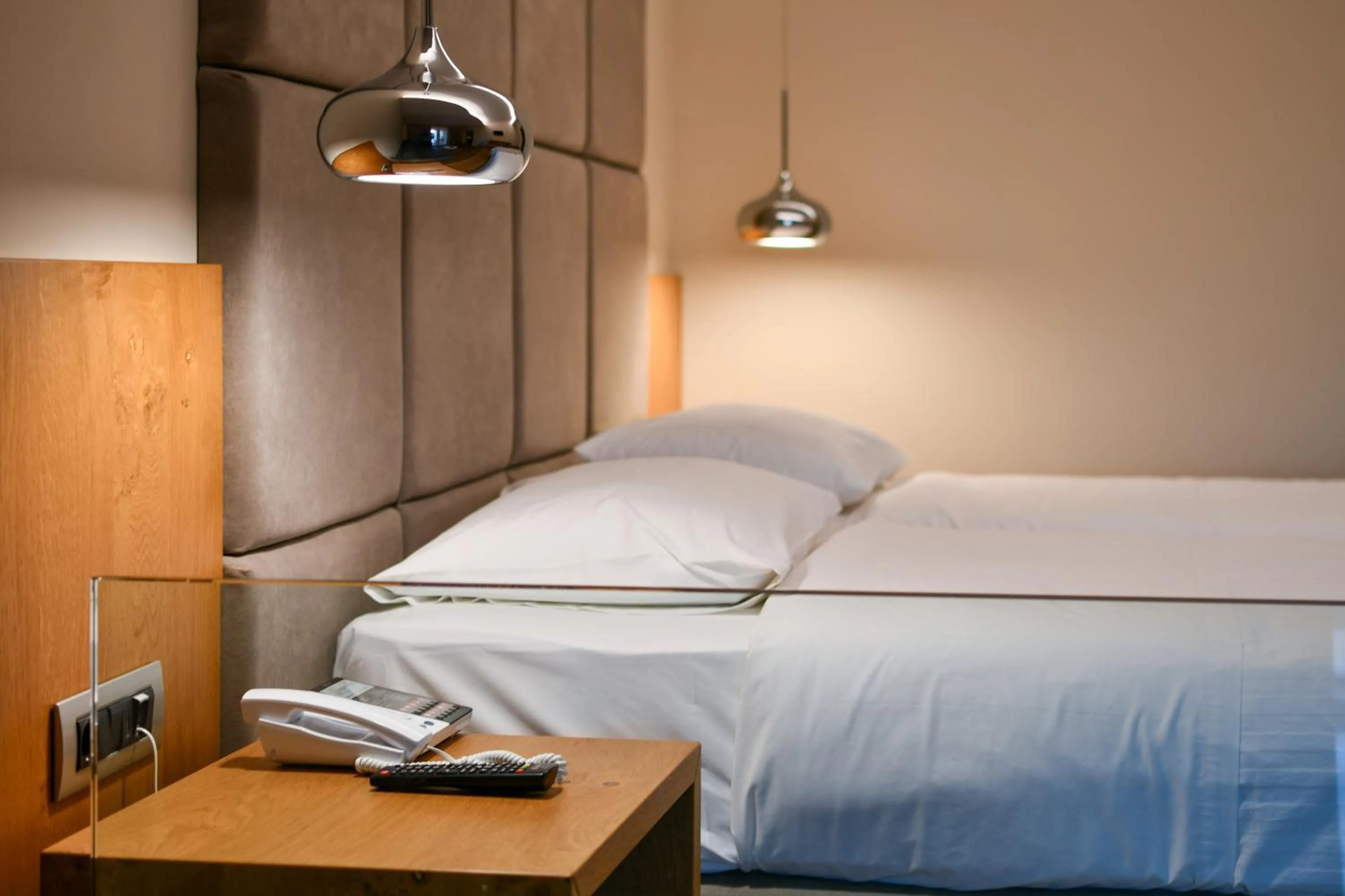 Bed in Olympion Asty Hotel