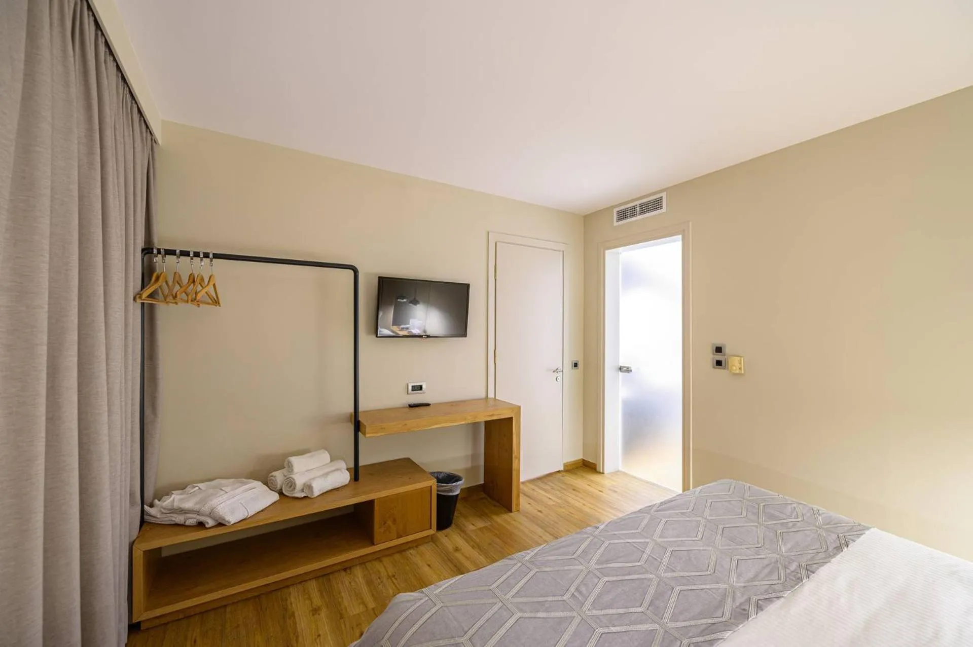 Bed in Olympion Asty Hotel