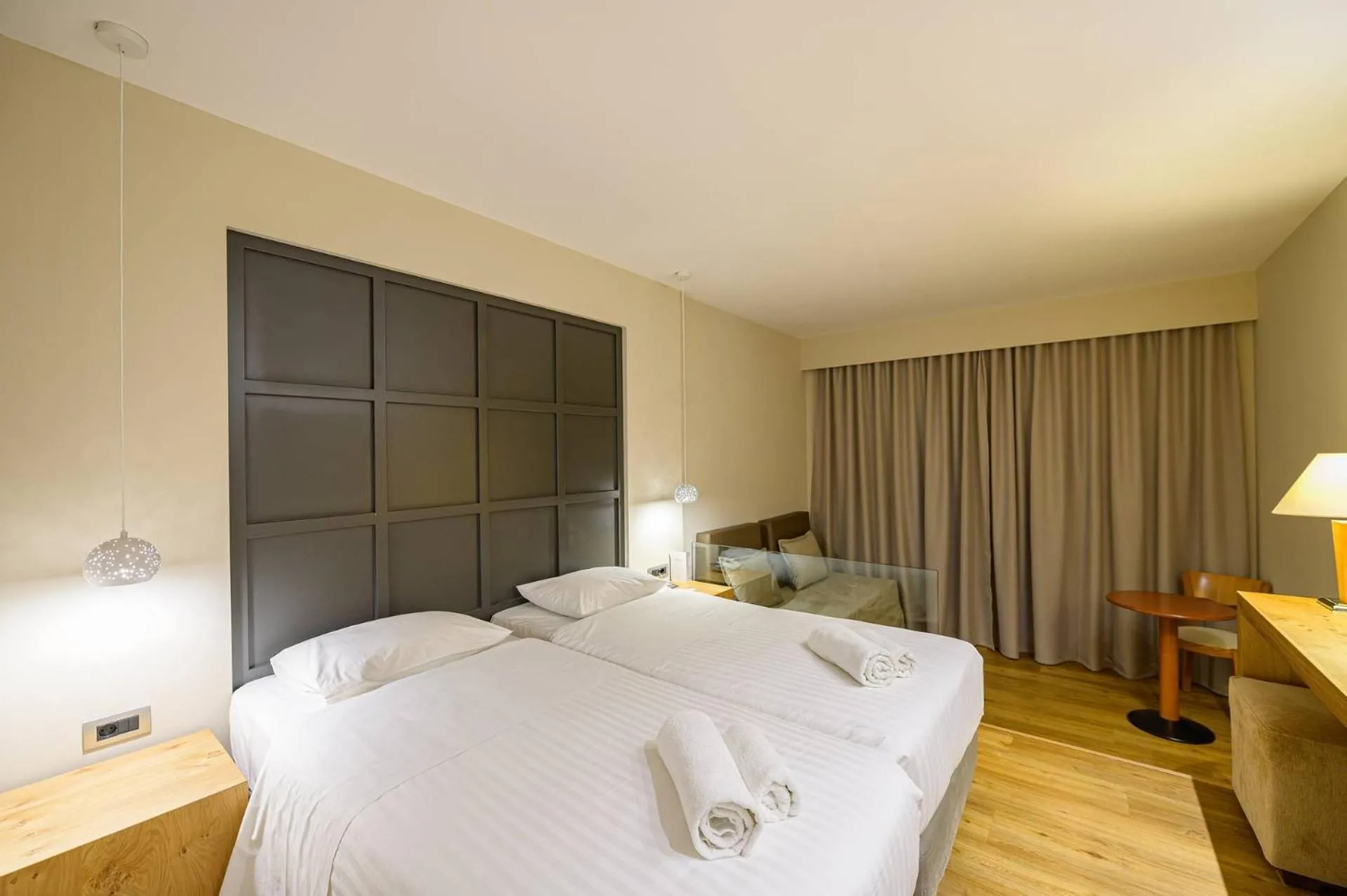 Bed in Olympion Asty Hotel