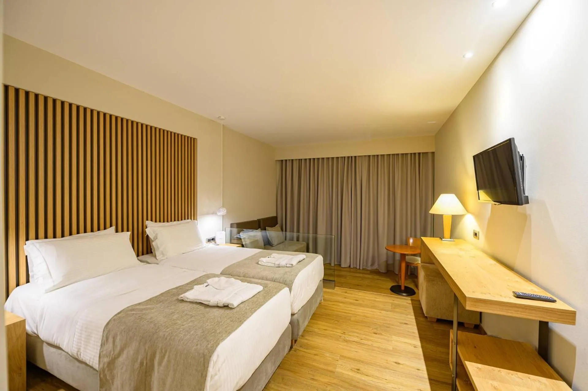 Bed in Olympion Asty Hotel