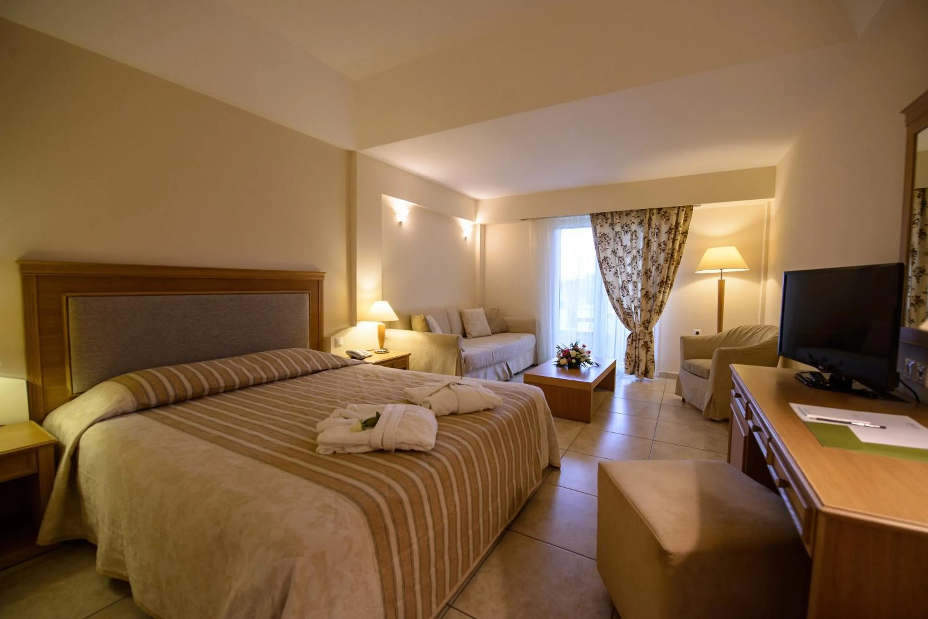 Bed in Olympion Asty Hotel
