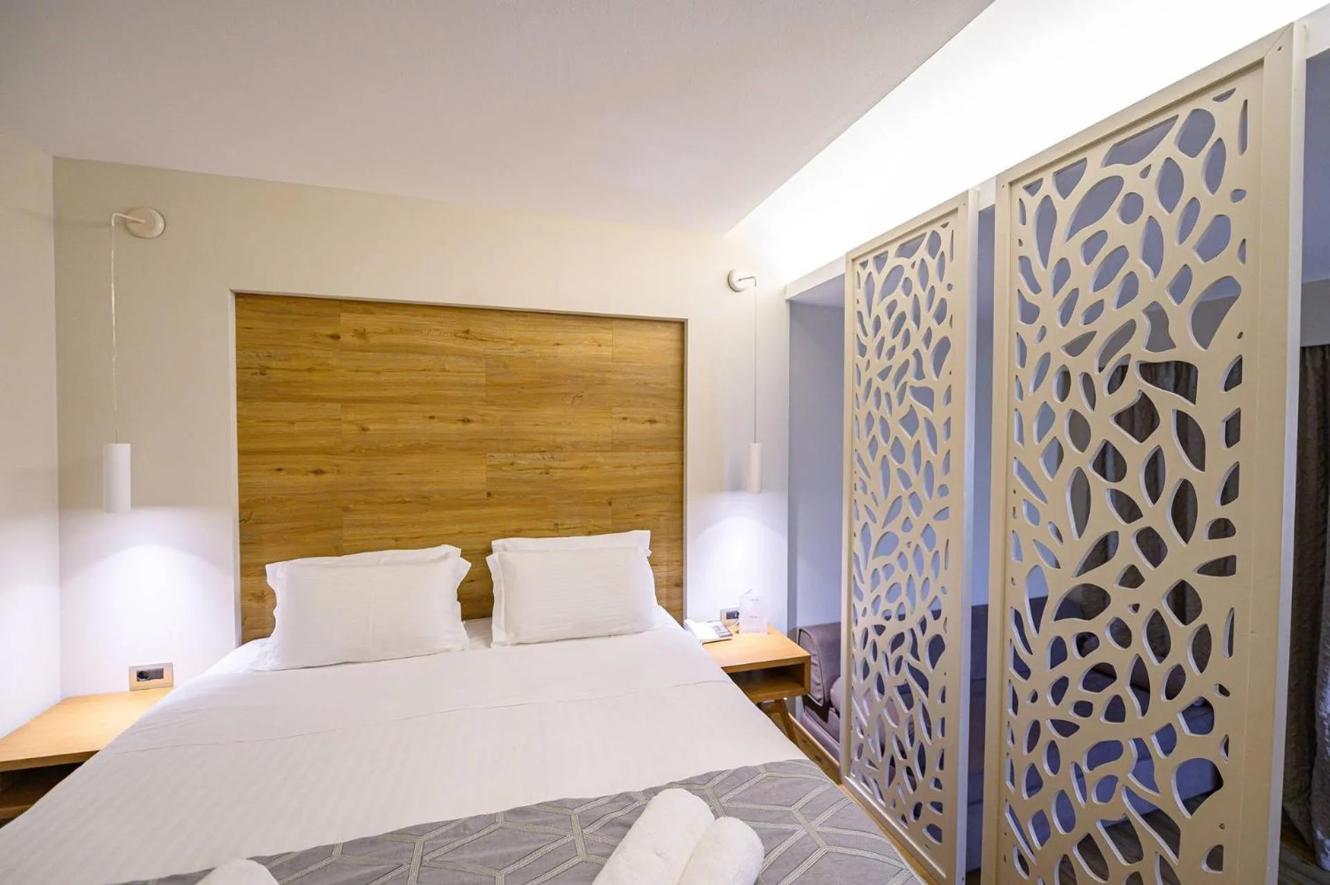 Bed in Olympion Asty Hotel