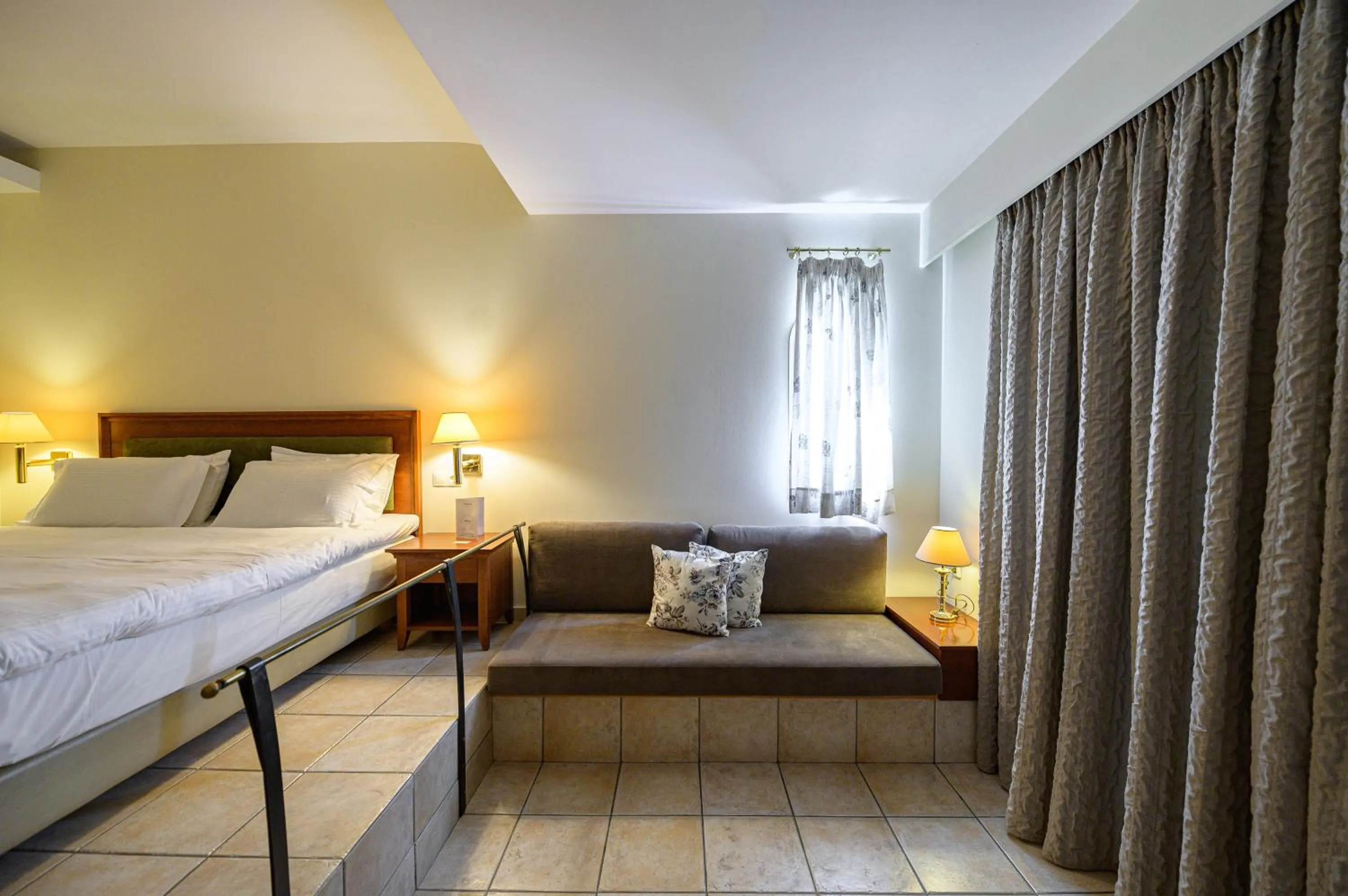 Bed in Olympion Asty Hotel