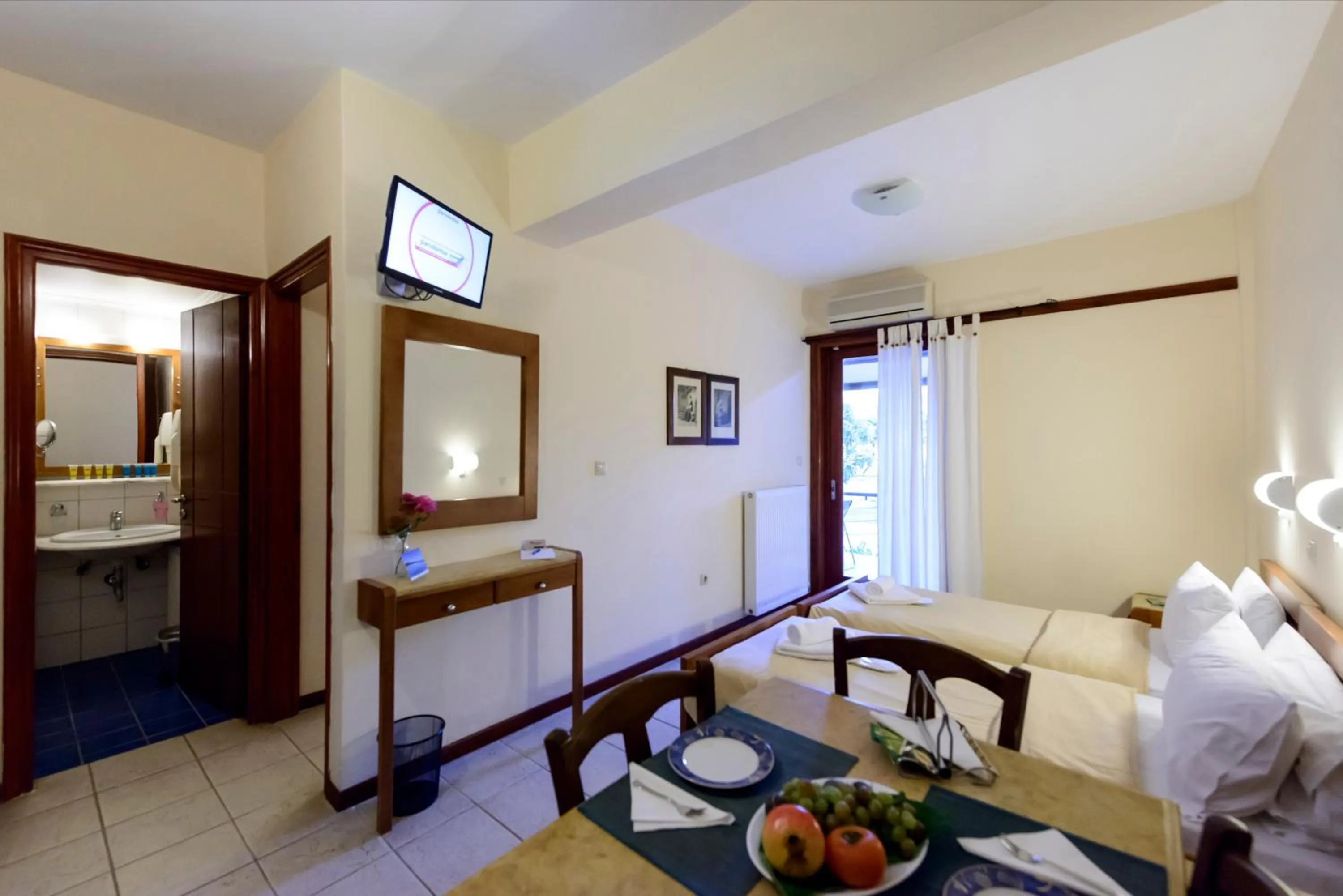 Photo of the whole room, Bed in Akroyali Hotel & Villas