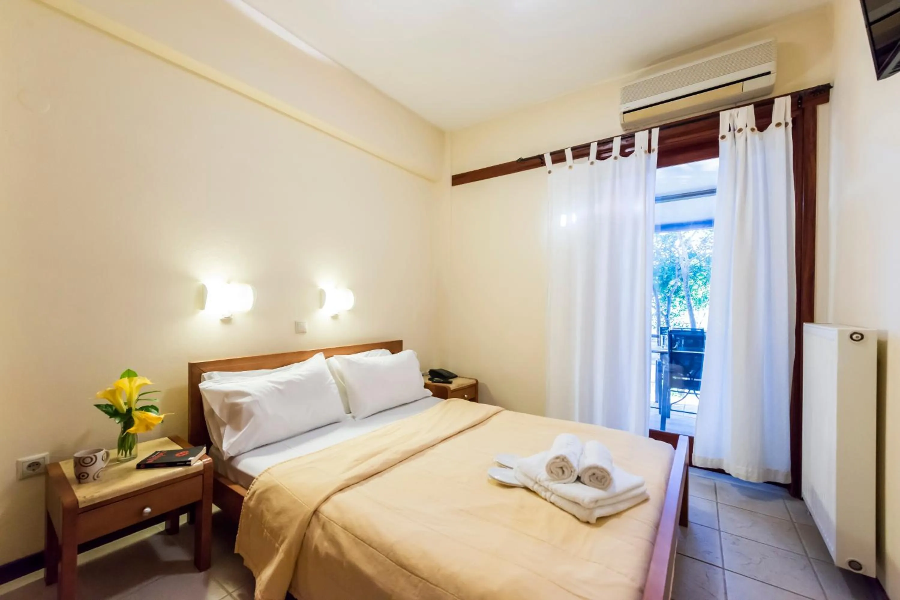 Photo of the whole room, Bed in Akroyali Hotel & Villas