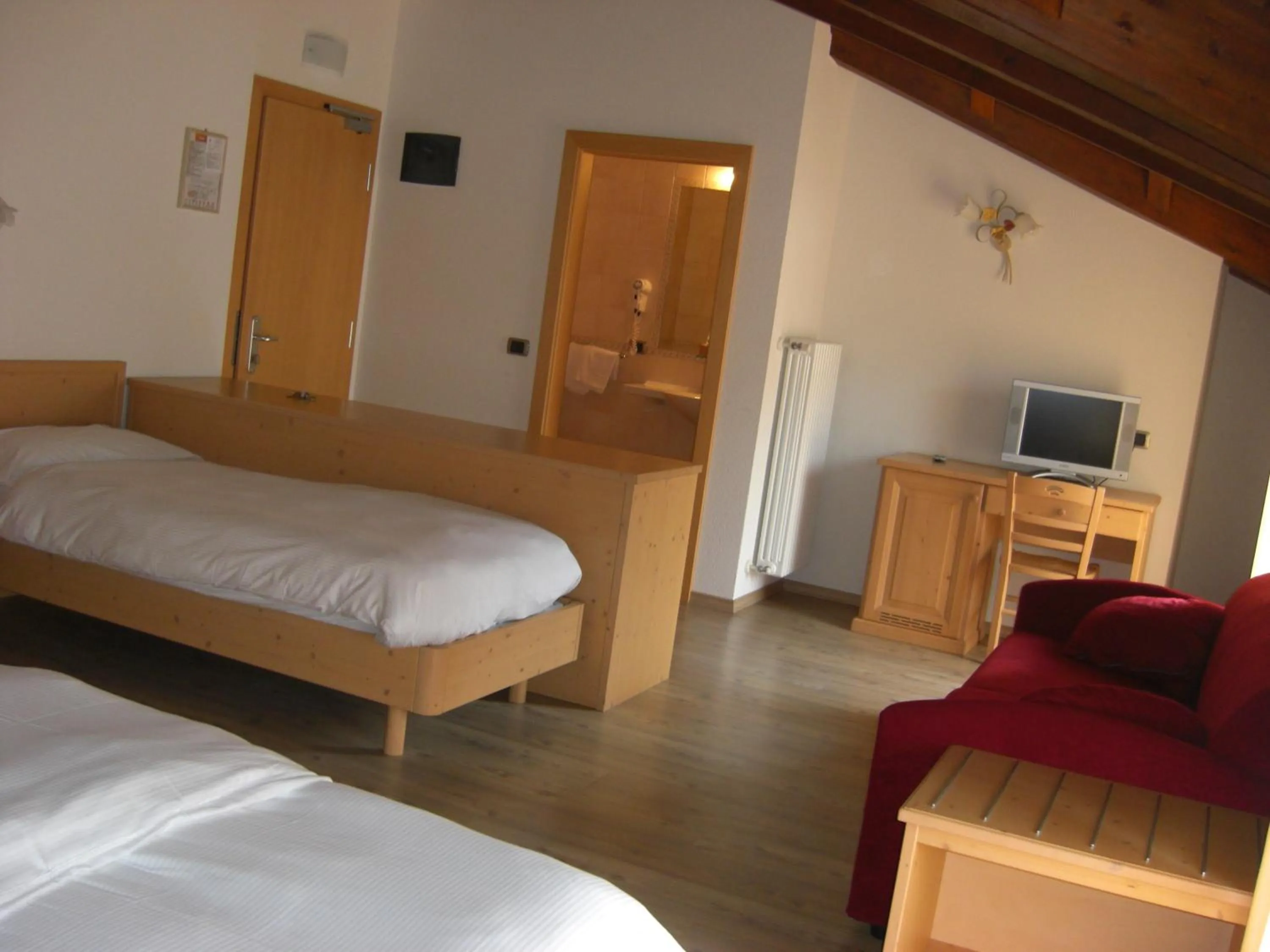 Photo of the whole room, Bed in Hotel Rosa Alpina