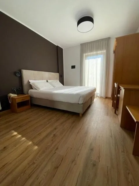 Bed in Hotel Rosa Alpina