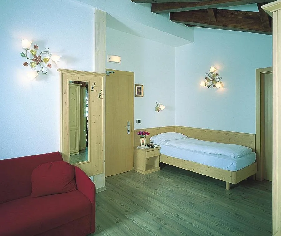 Bed in Hotel Rosa Alpina