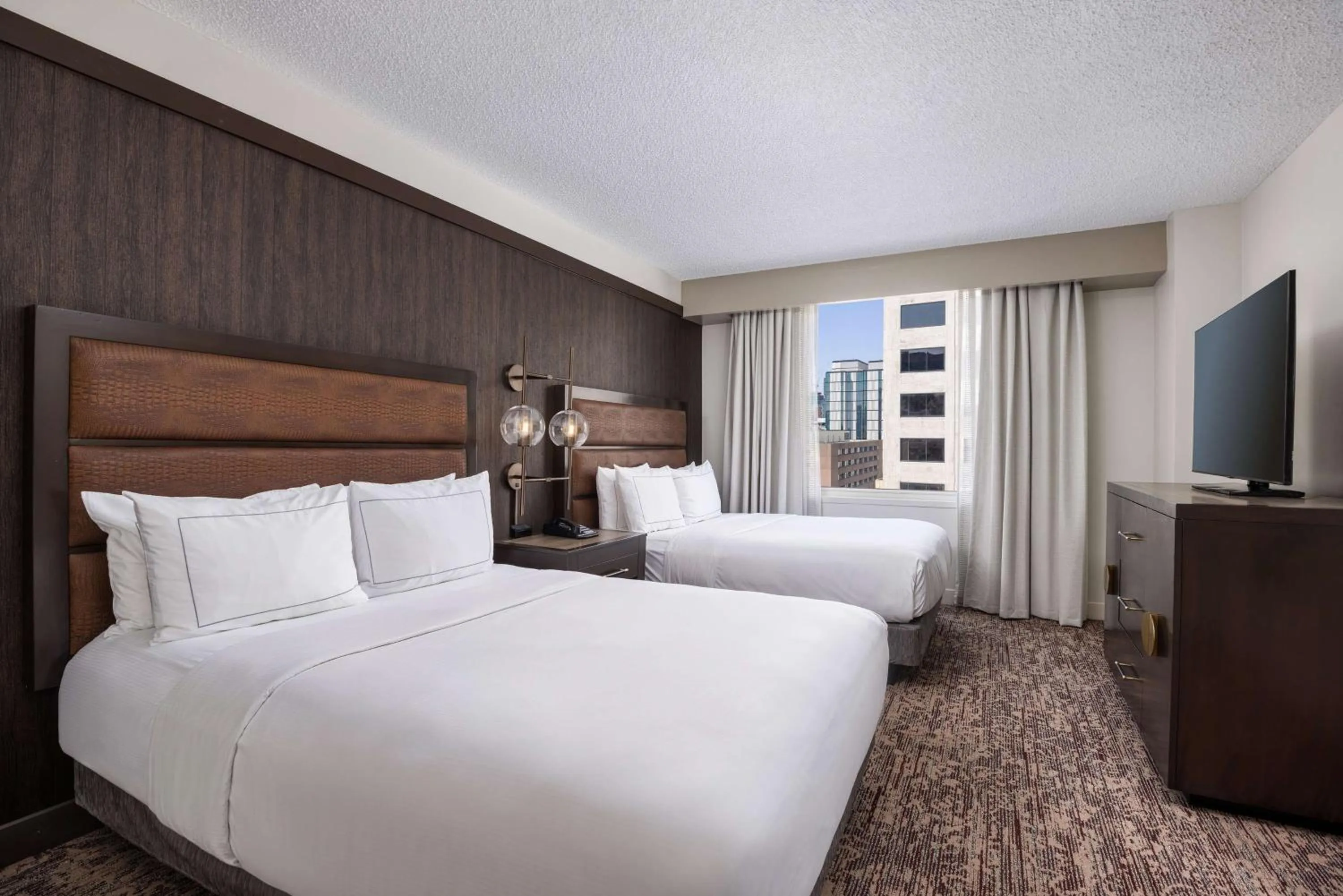 Bed in DoubleTree Suites by Hilton Austin Downtown Capitol