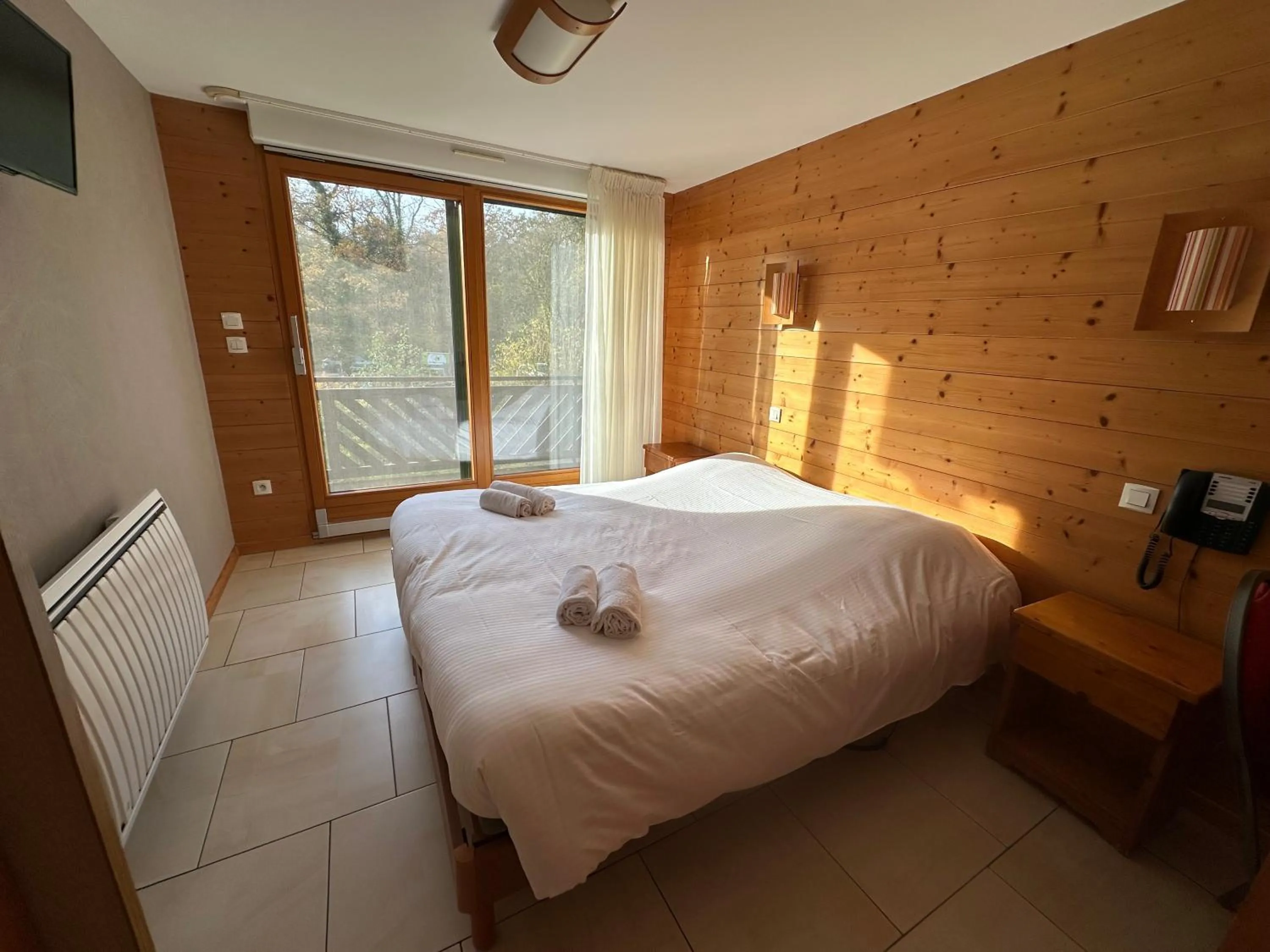 Bedroom, Bed in Hôtel Résidence La Maison par Les Pins Sylvestres Amnéville les Thermes