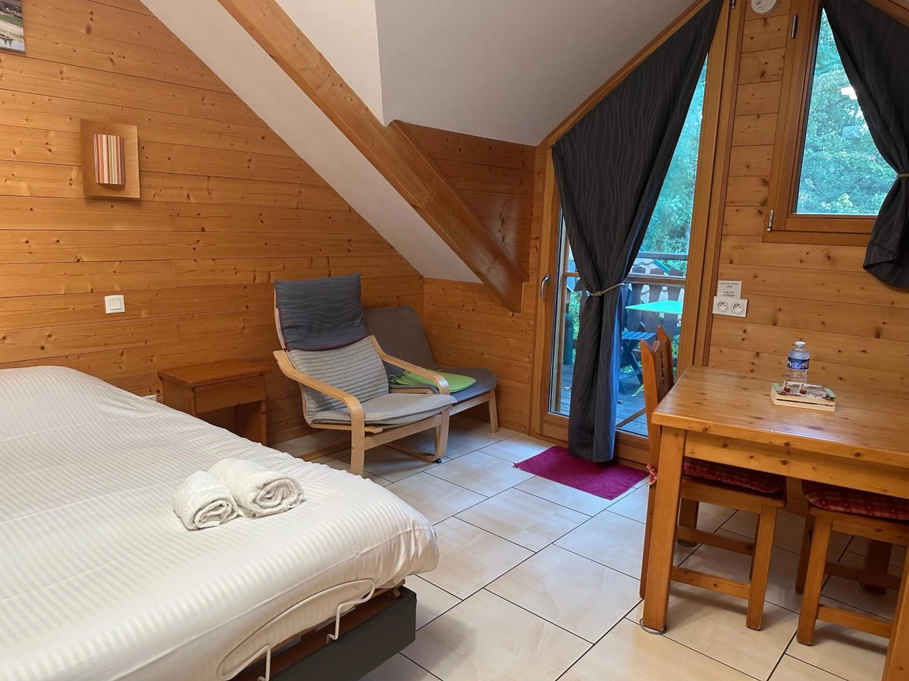 Bedroom, Bed in Hôtel Résidence La Maison par Les Pins Sylvestres Amnéville les Thermes