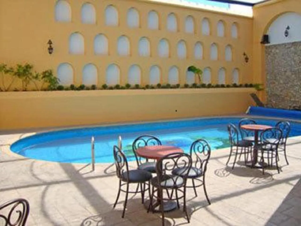 Swimming Pool in Hotel Hacienda de los Ángeles by Rotamundos