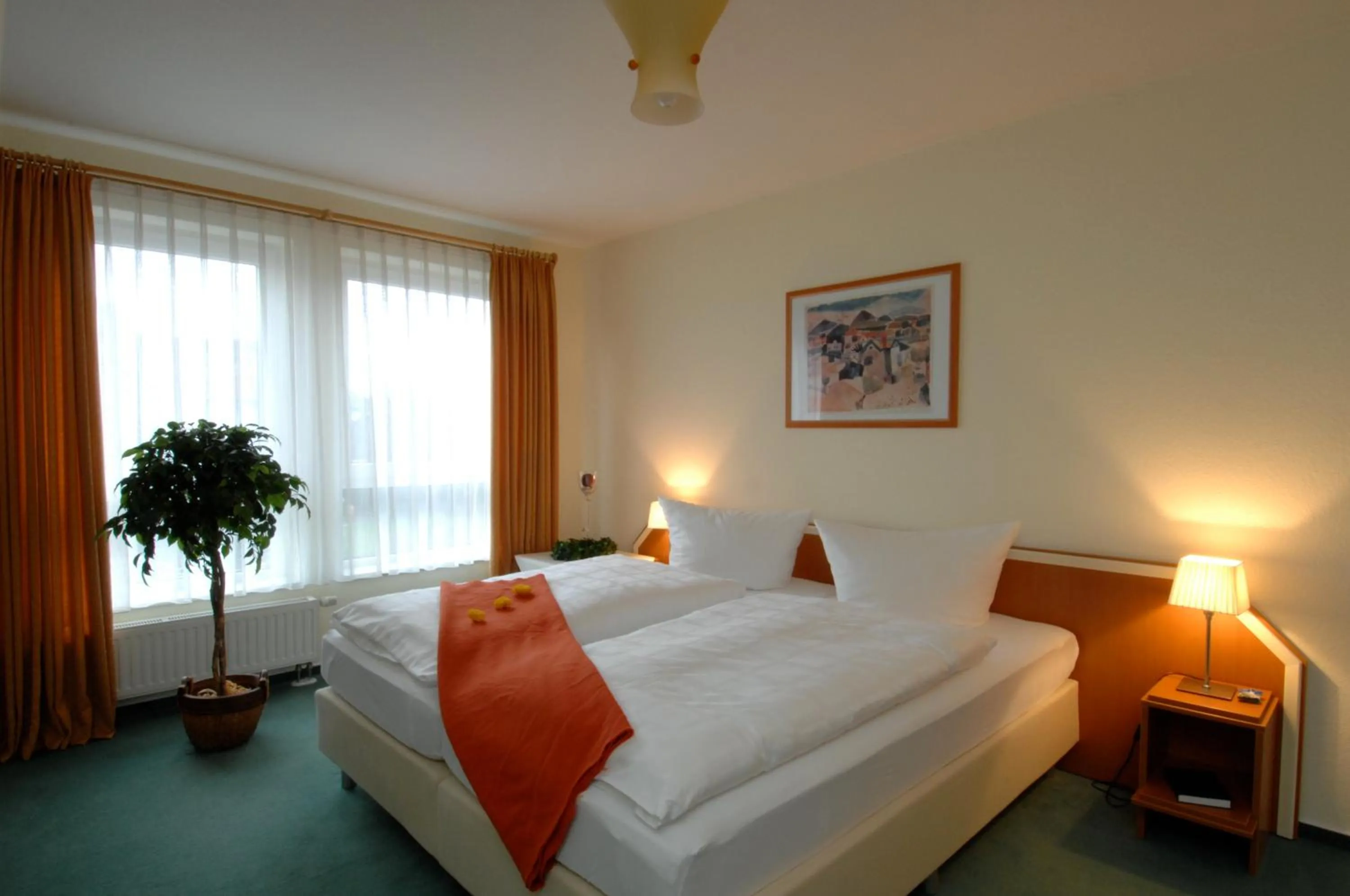 Bed in Grothenns Hotel 3-Sterne superior