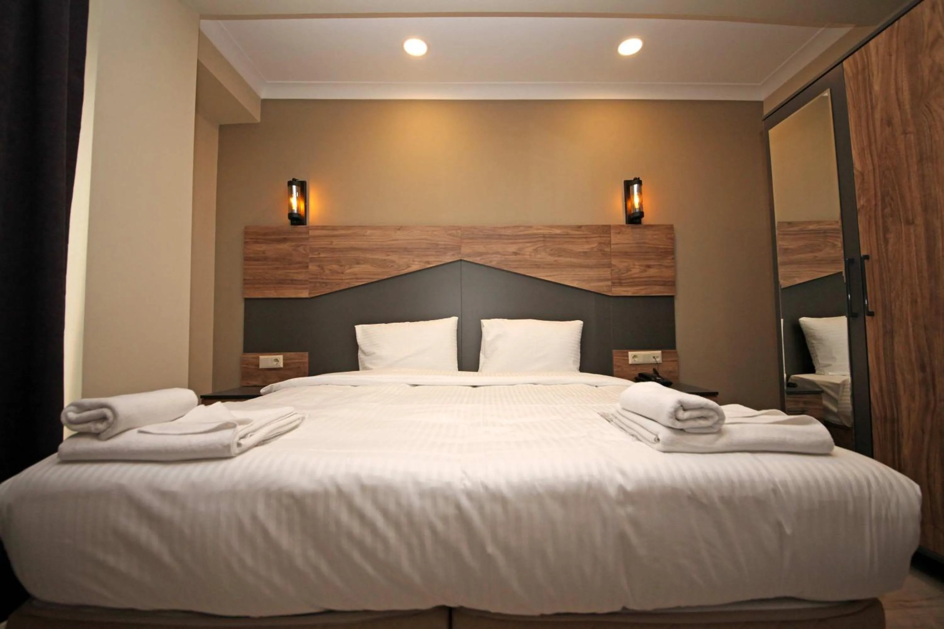 Bed in Corner Suite