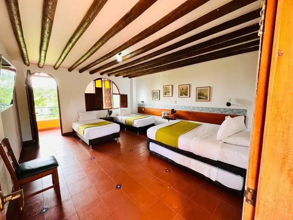 Triple Room in Hotel Pueblito Cafetero Triple Room in Hotel Pueblito Cafetero