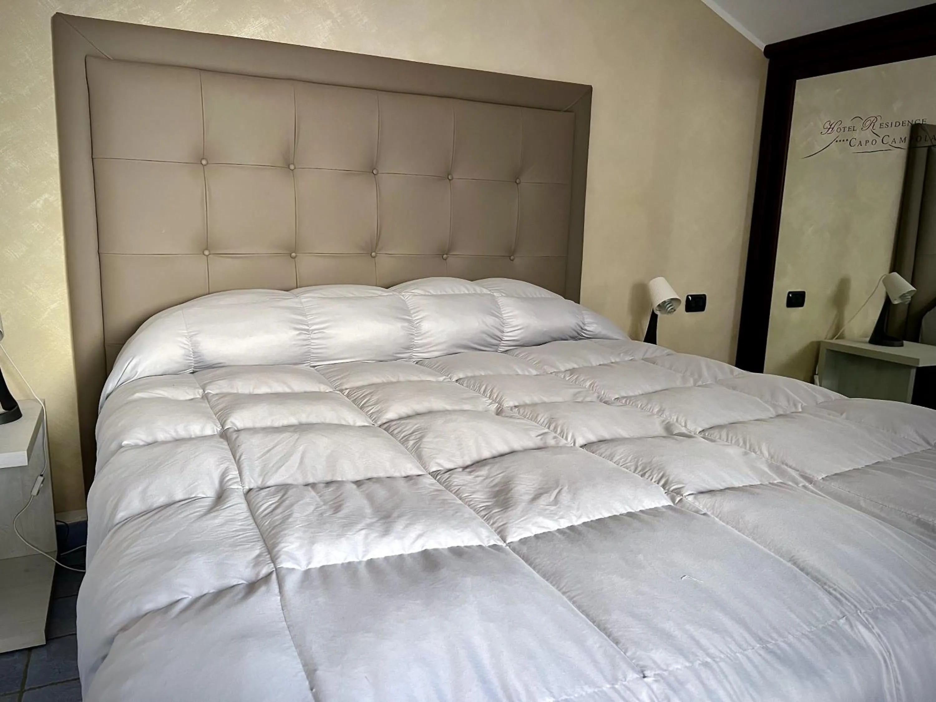 Bed in Hotel Capo Campolato