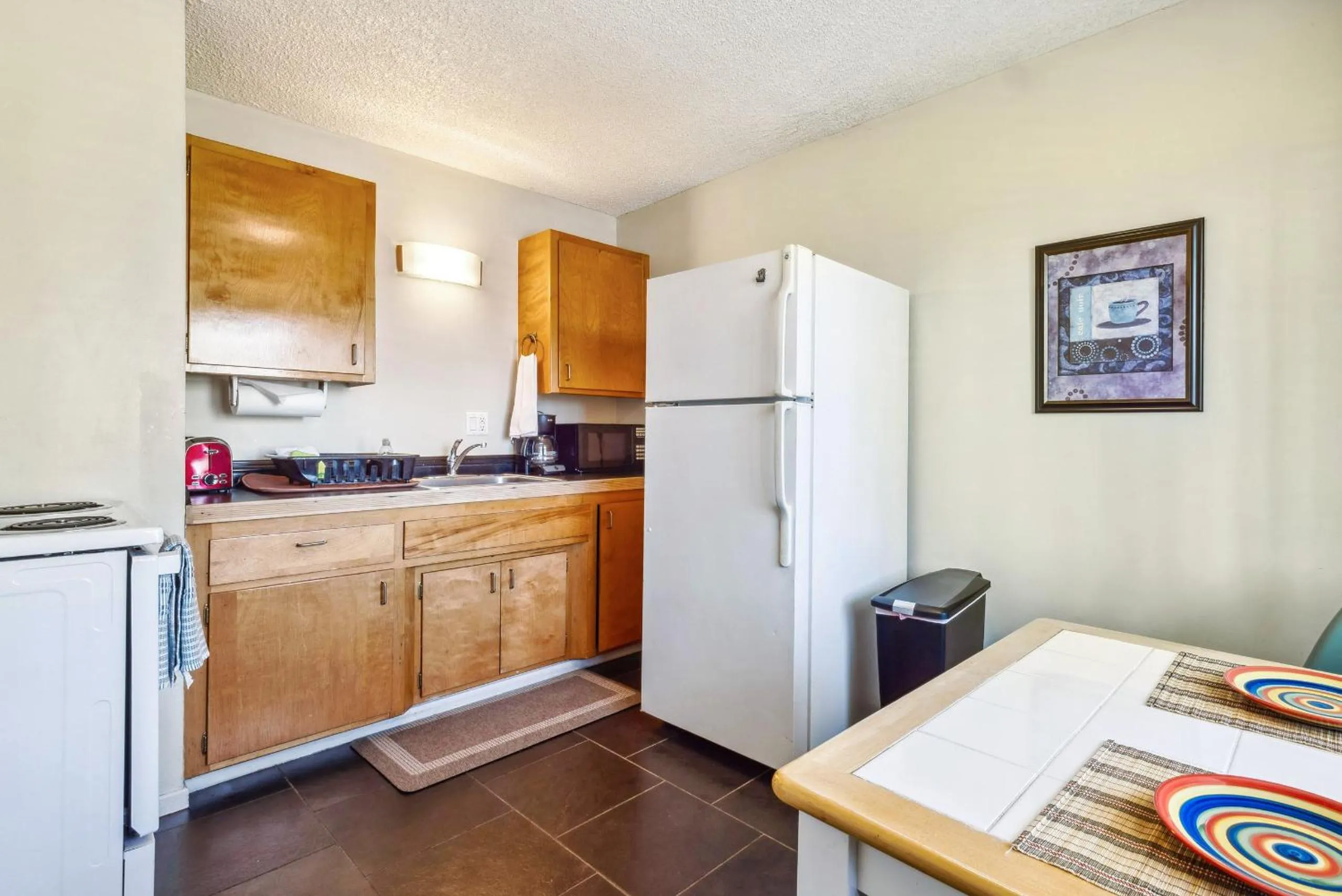 Kitchen or kitchenette in Lido Palms Resort and Spa