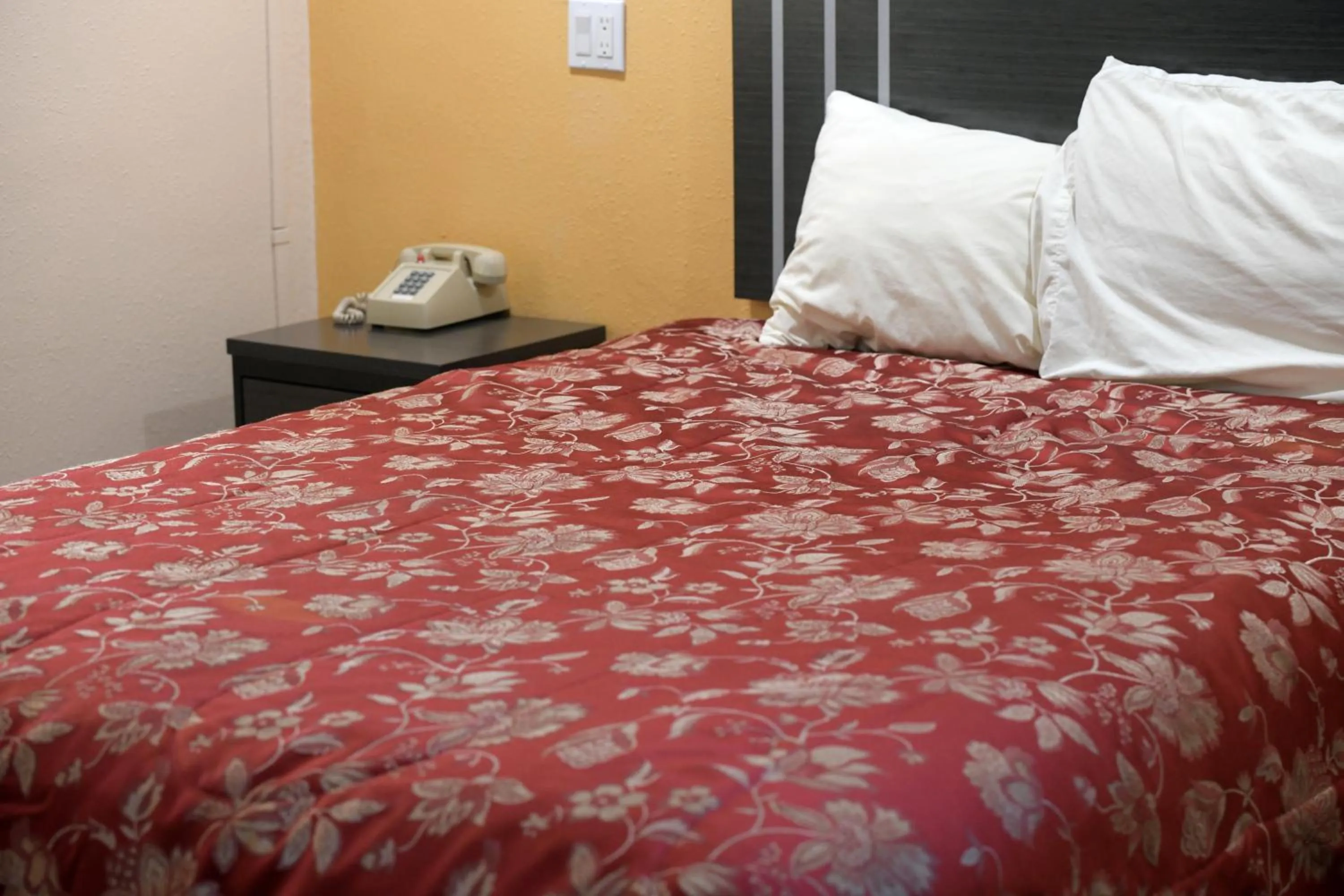 Bed in A-1 Budget Motel