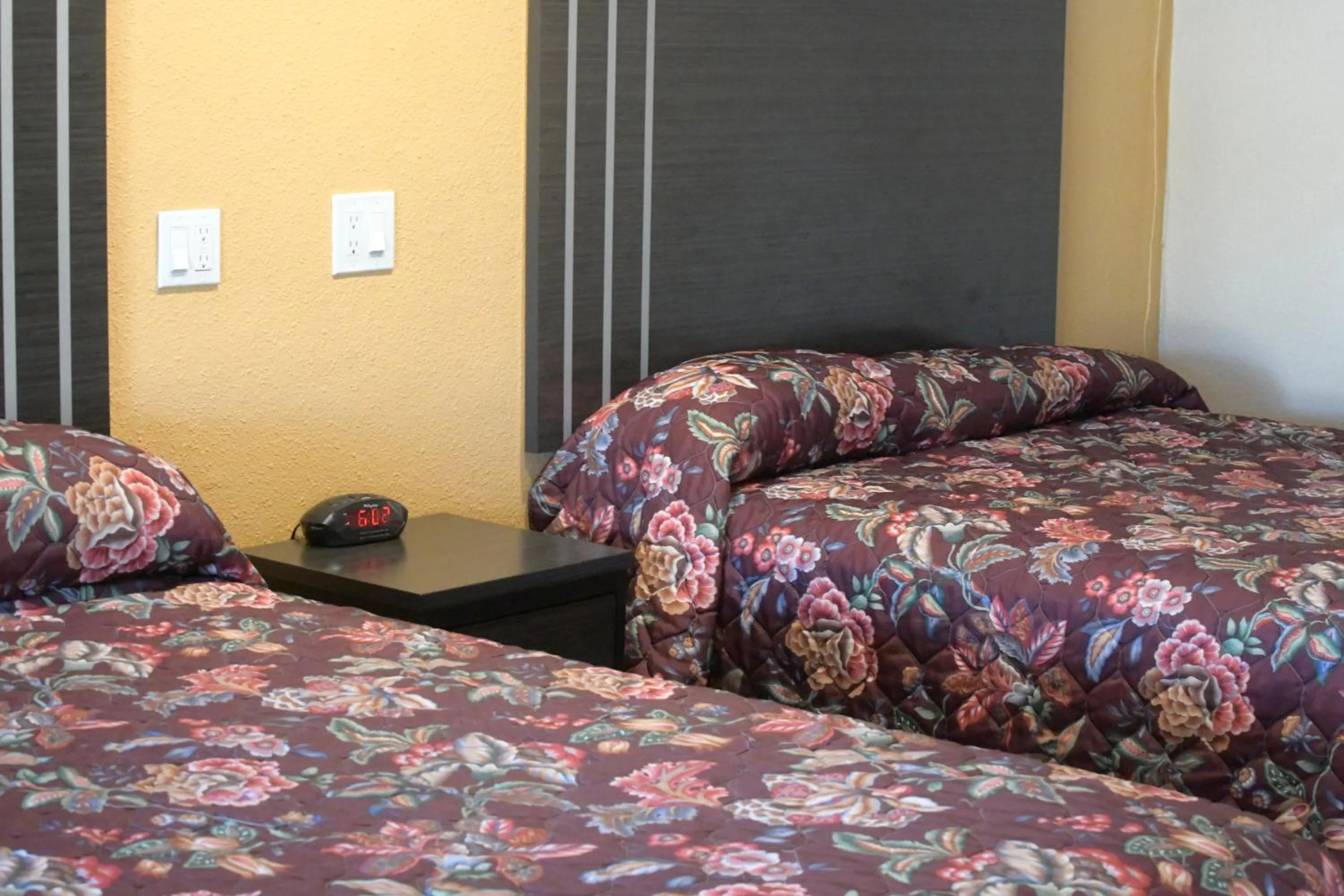 Bed in A-1 Budget Motel
