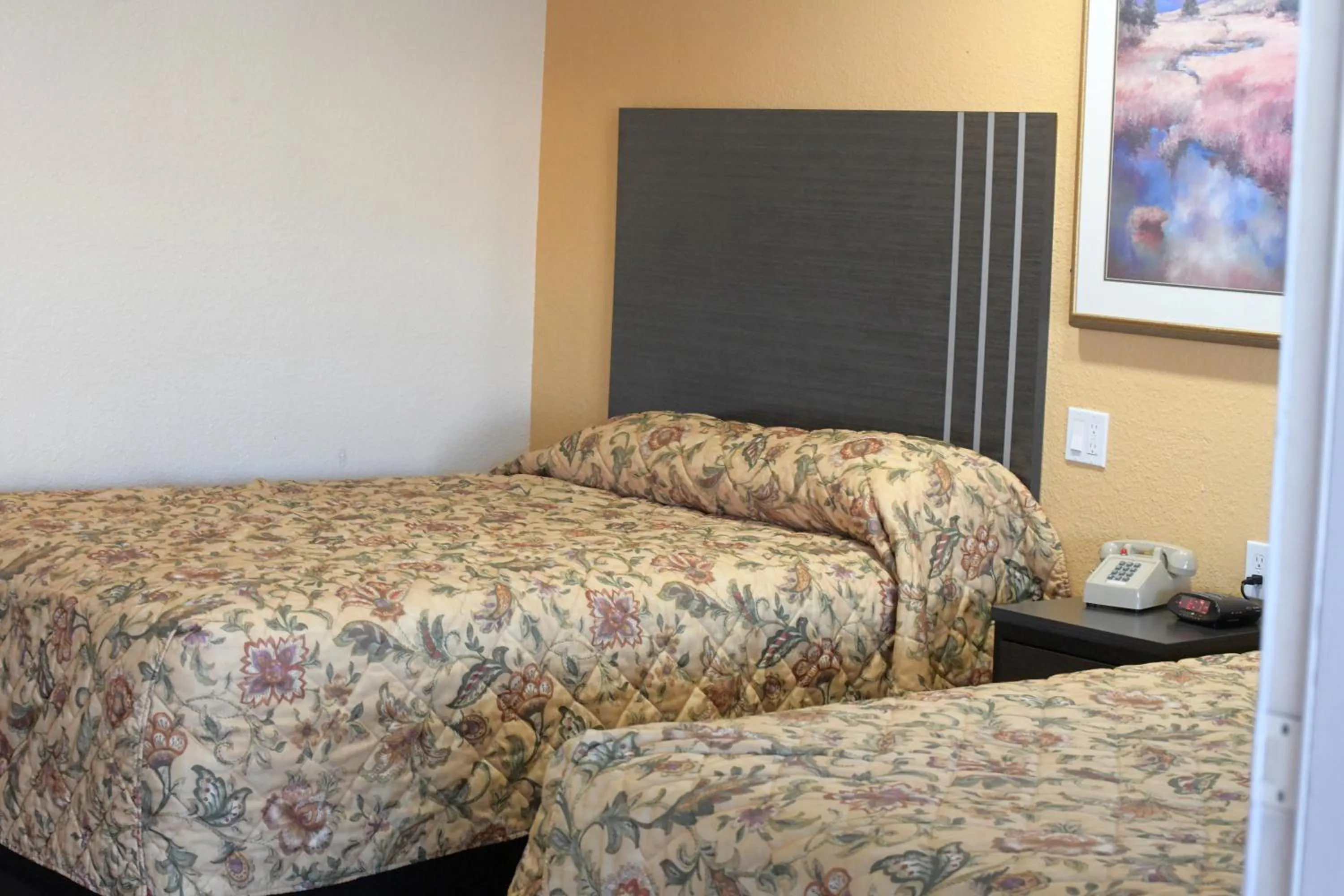 Bed in A-1 Budget Motel